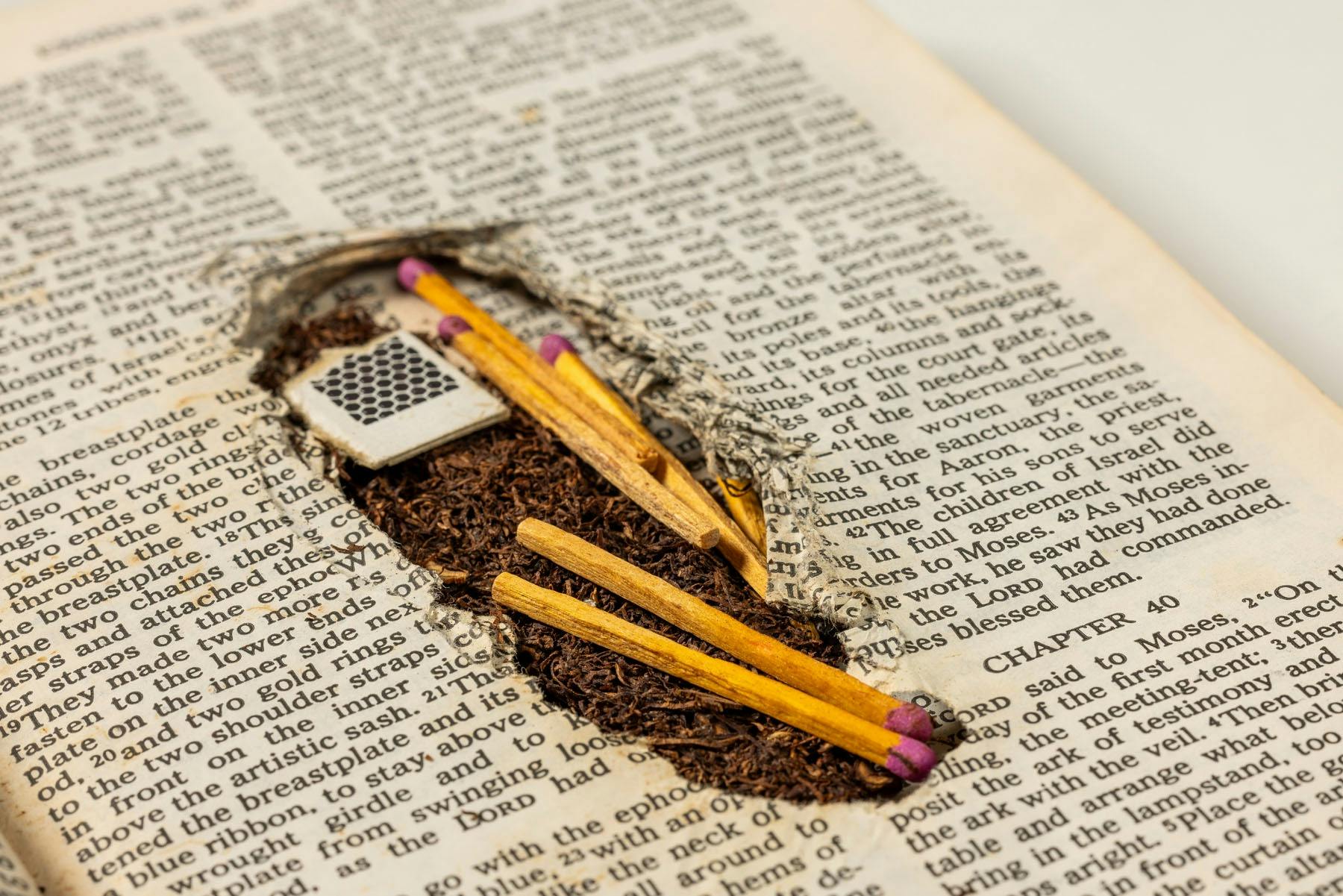 Tabaco and matches hidden inside a bible