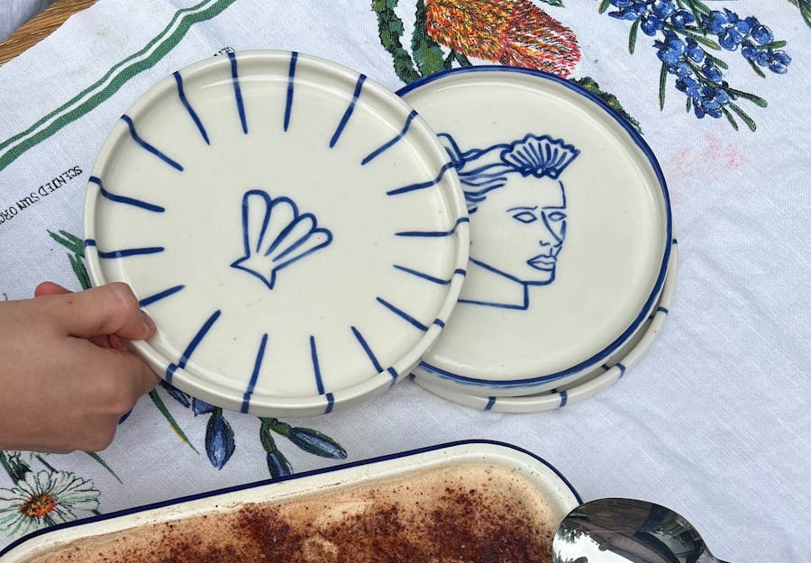 two plates with blue graphic design on them