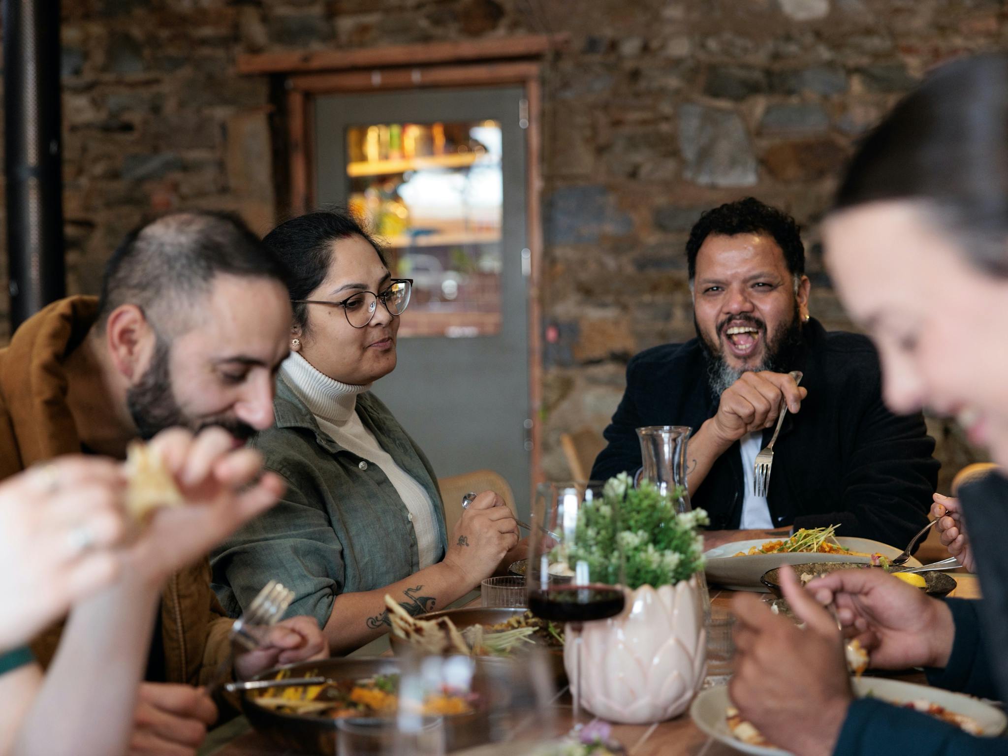 Image of diners enjoying meal in restaurant