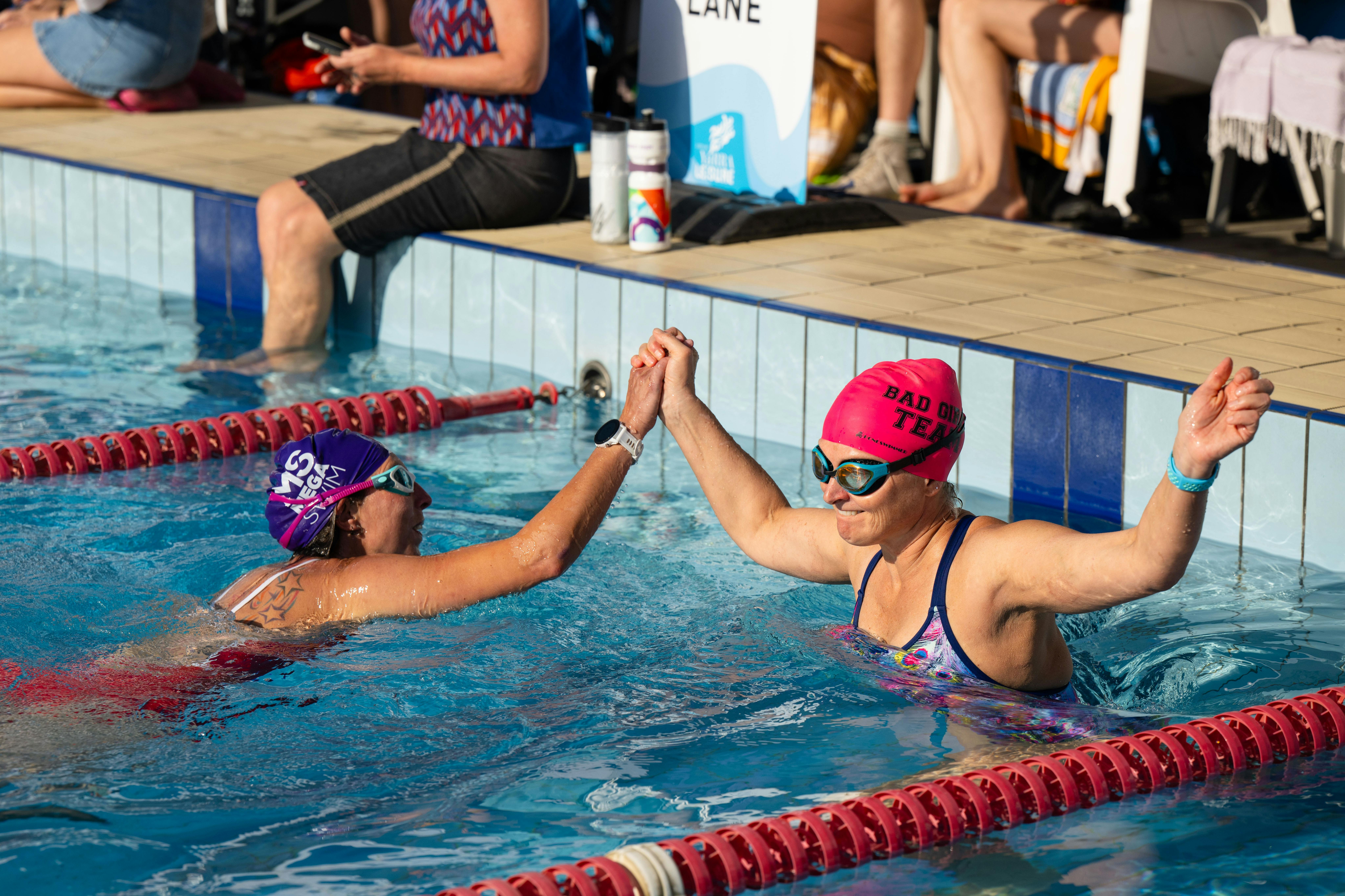 relay team high-fiving