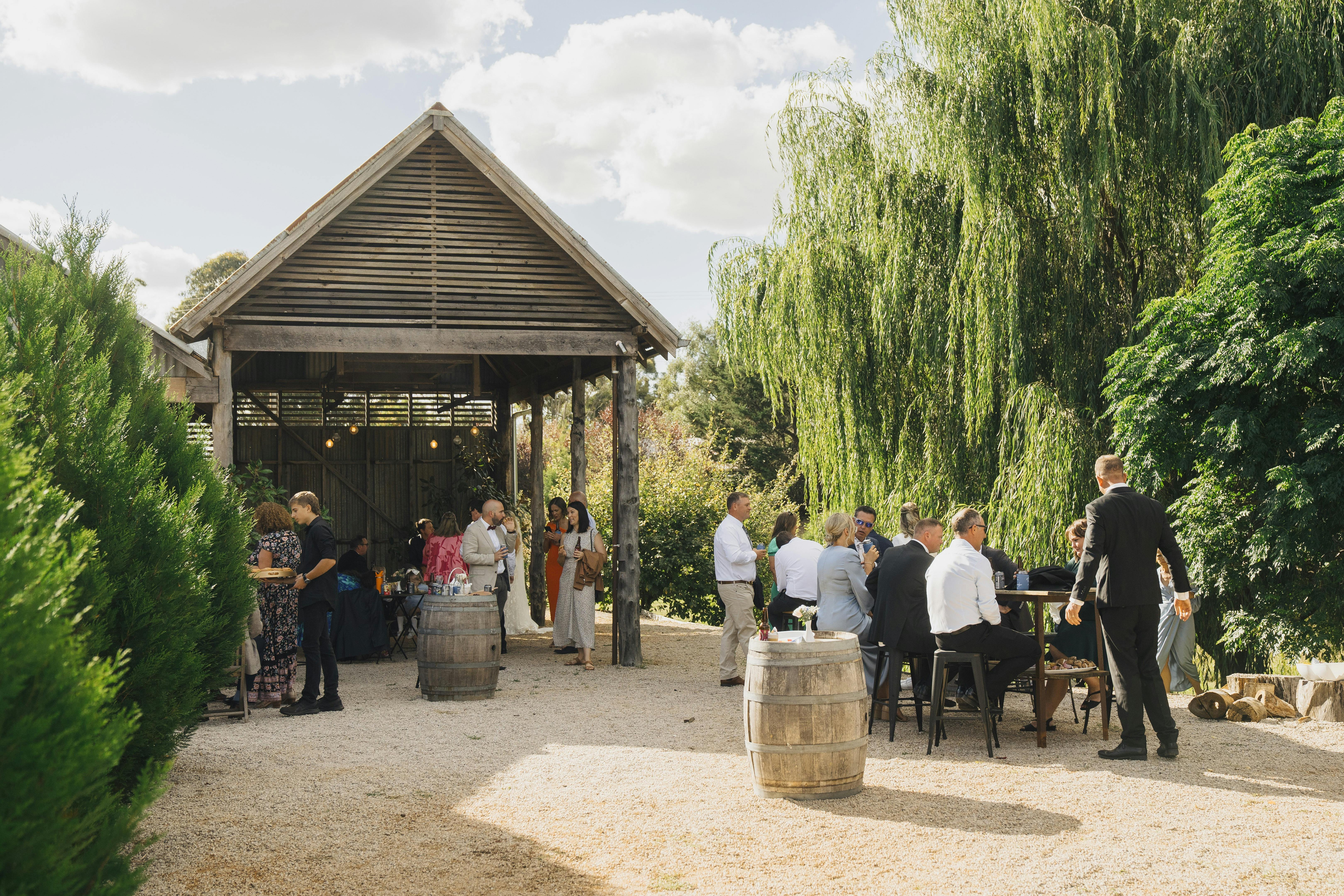 The Butter Factory at Philip Shaw Wines- A rustic wooden open covered area surrounded by trees
