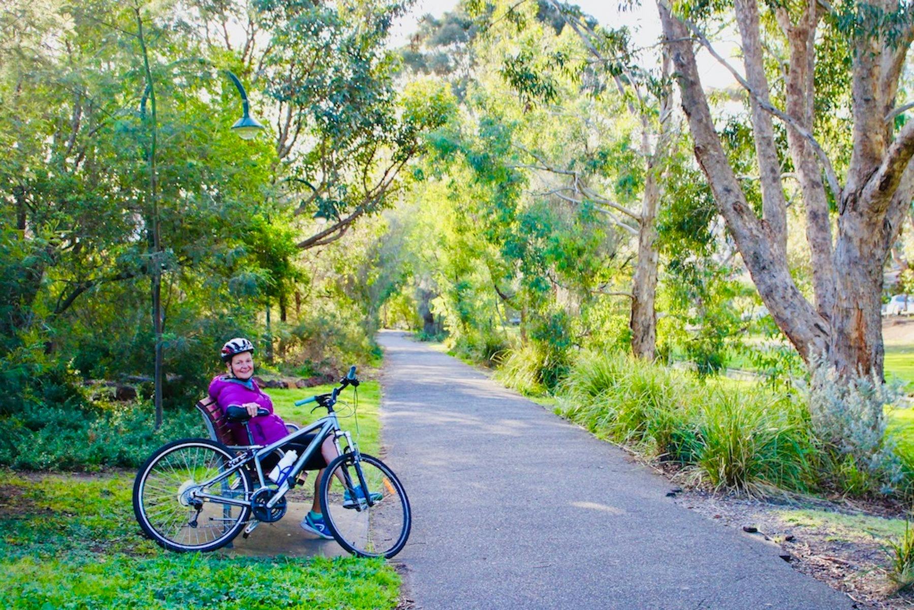 cycling along the elwood canal on a brighton bayside cycle tour