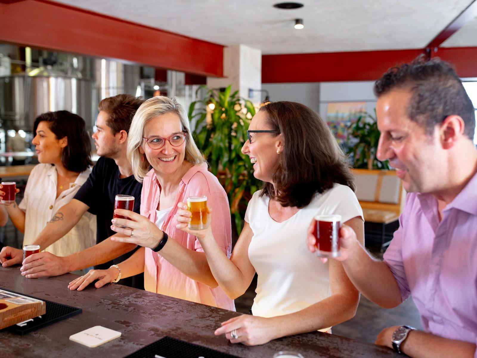 Enjoying beers at the bar at Burleigh Brewing Enjoying beers at the bar at Burleigh Brewing