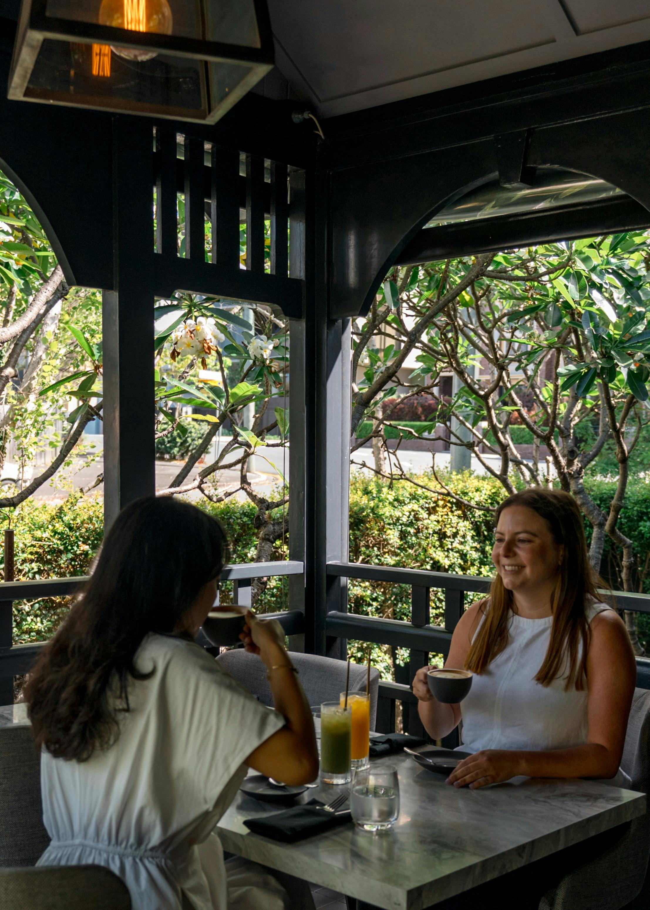 ladies sitting on deck chatting