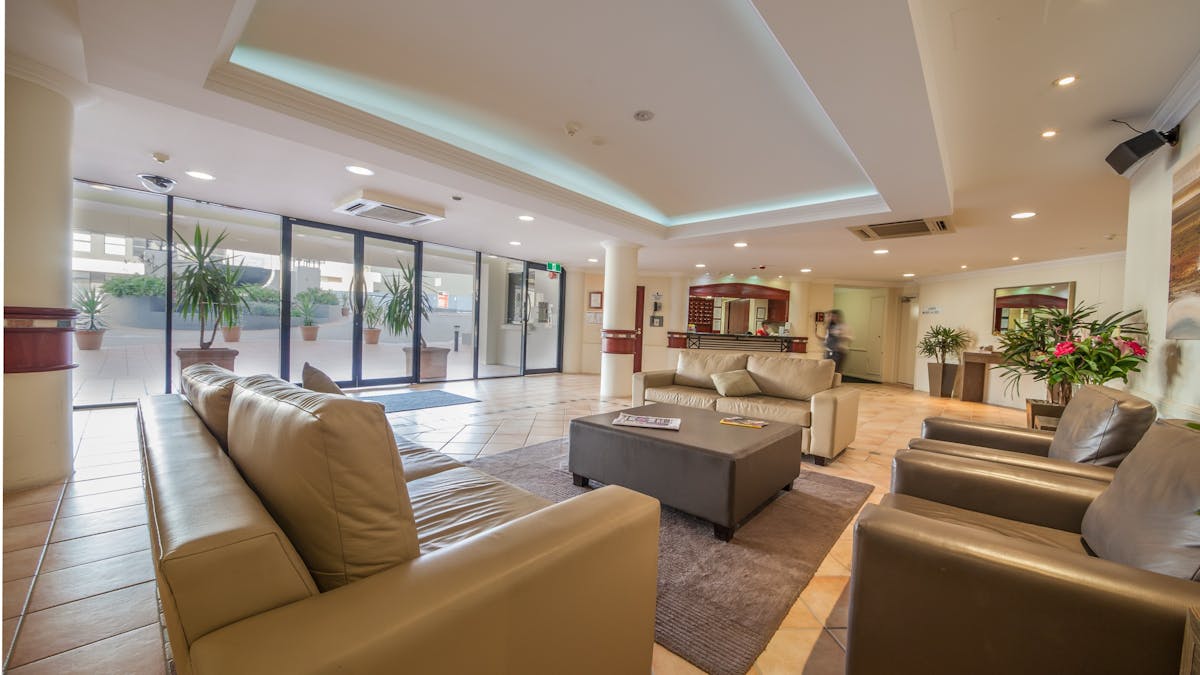 Reception and lobby area at West End Central Apartments