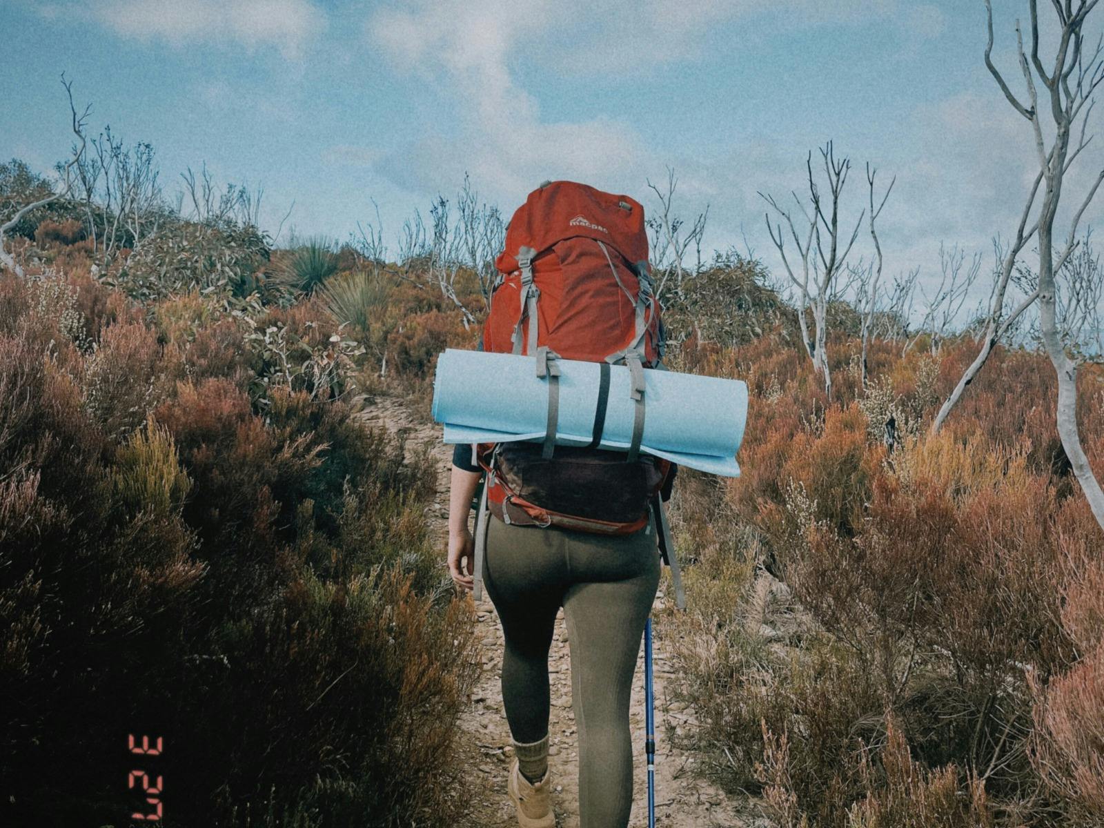 woman hiking the Deep Creek Circuit Hike Enliven Outdoor Adventures