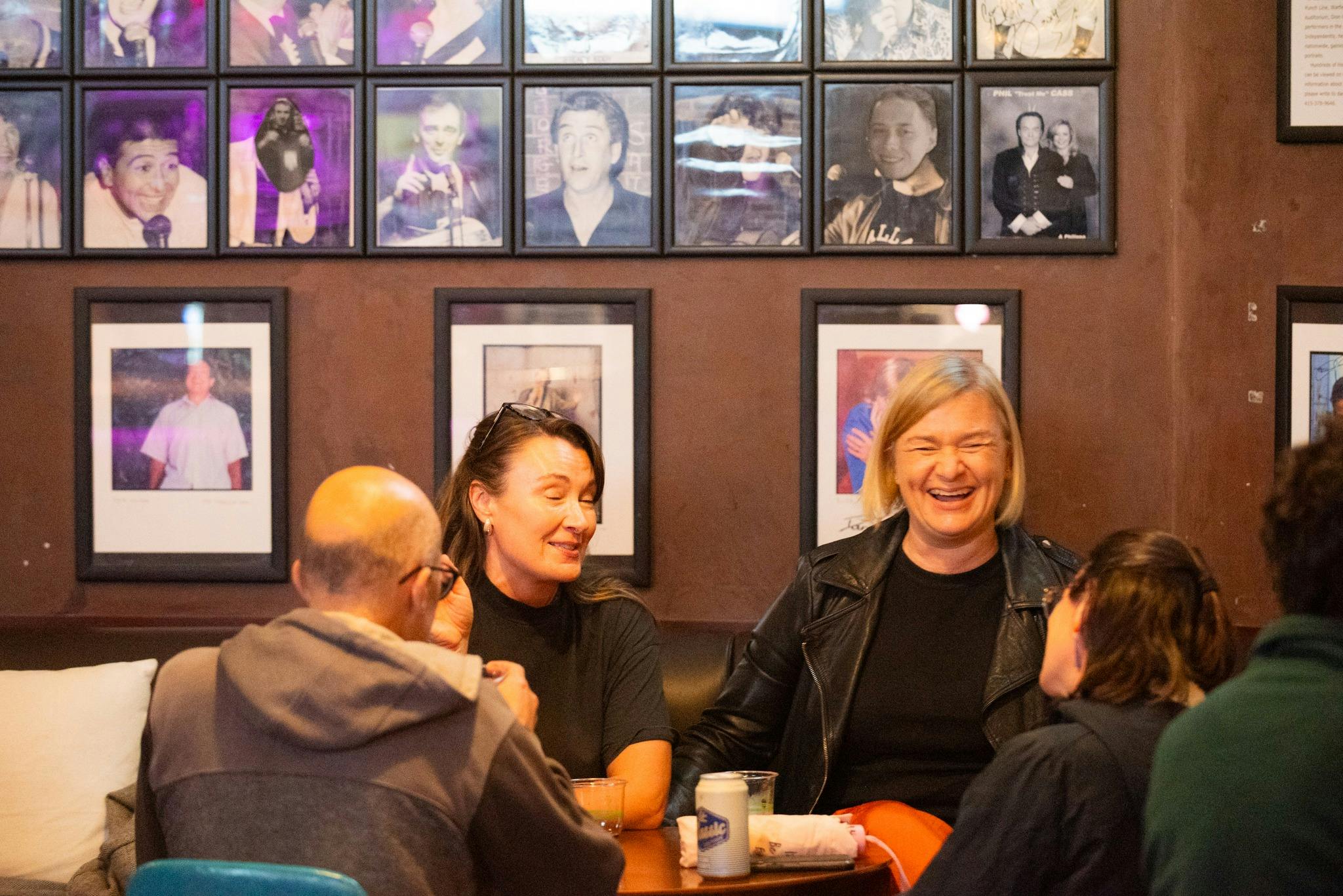 Guests enjoying the bar and lounge area at The Comedy Store prepared for before a show.