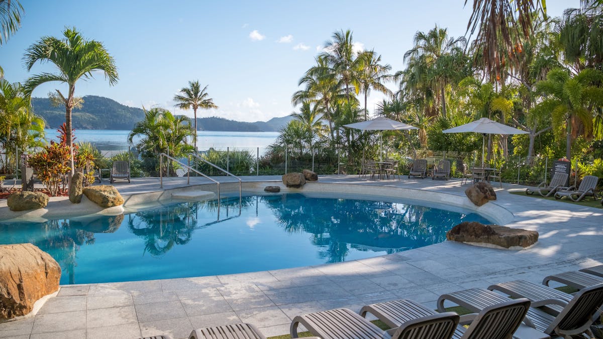 Lagoon-style swimming pool with view of Catseye Beach