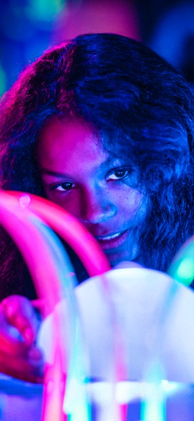 Child enjoying the Illuminate exhibition