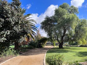 expansive back lawn and garden with peppercorn treeHistoric Tanunda House