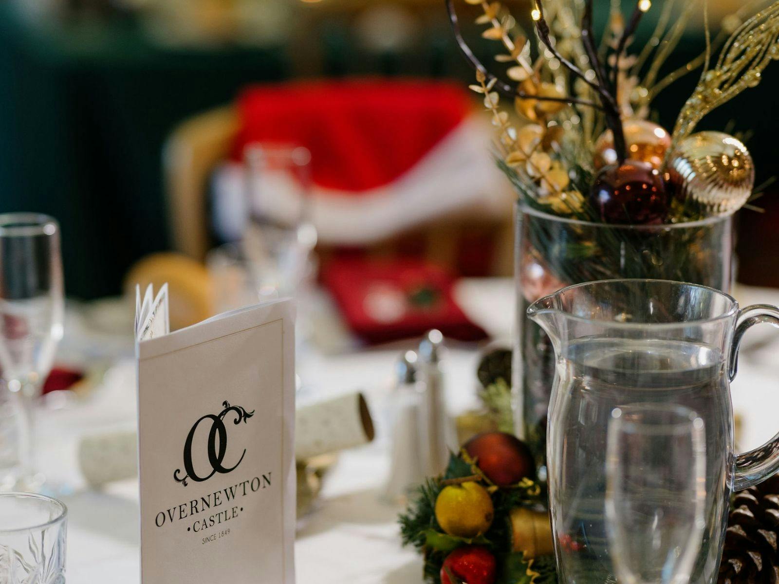 Christmas Table decor with a santa hat in the background