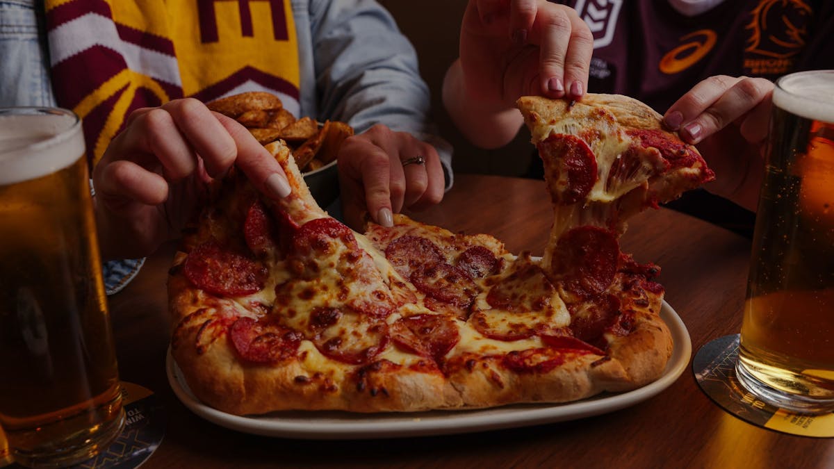 People eating pizza