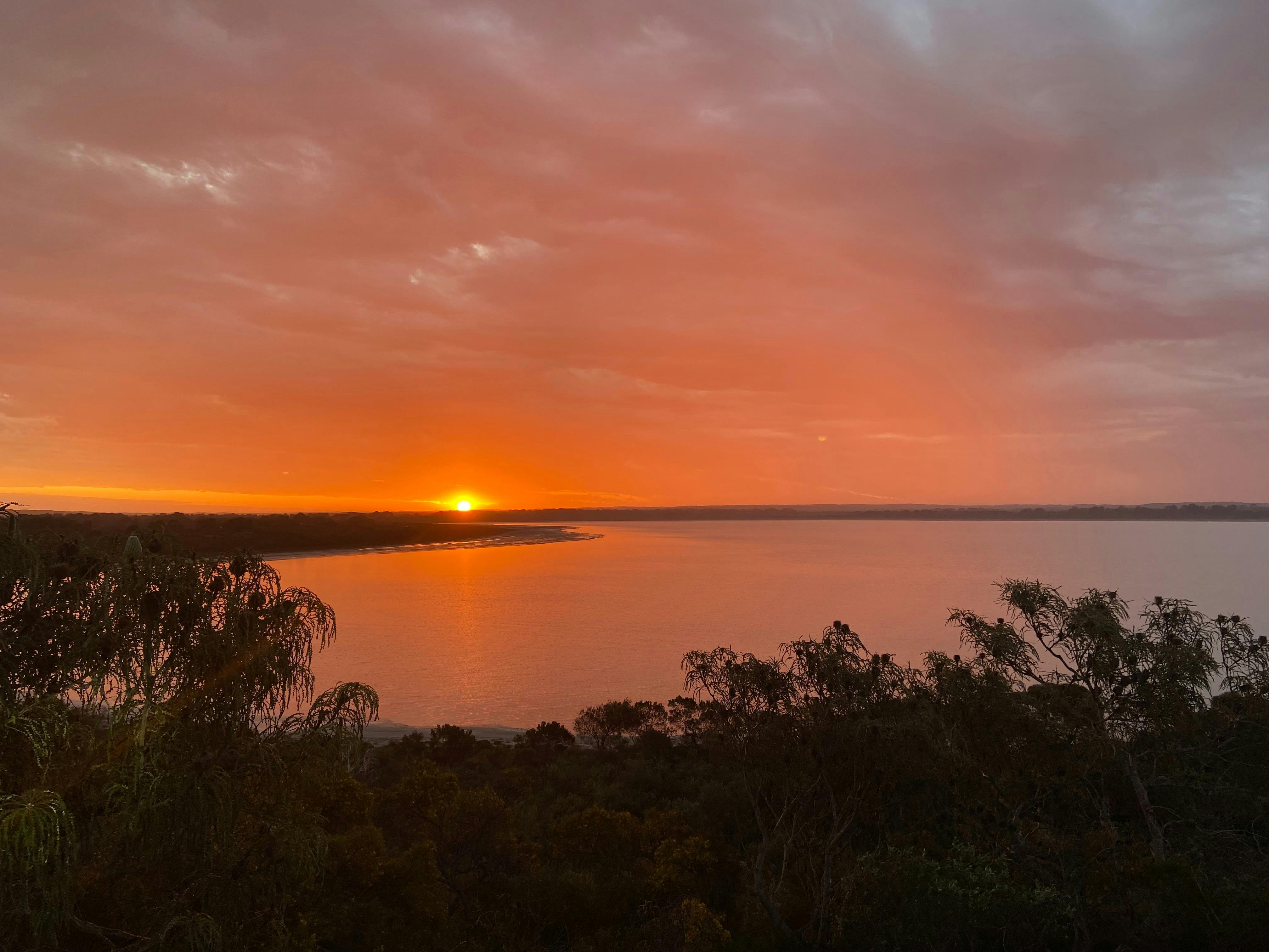 sunset over pink lake