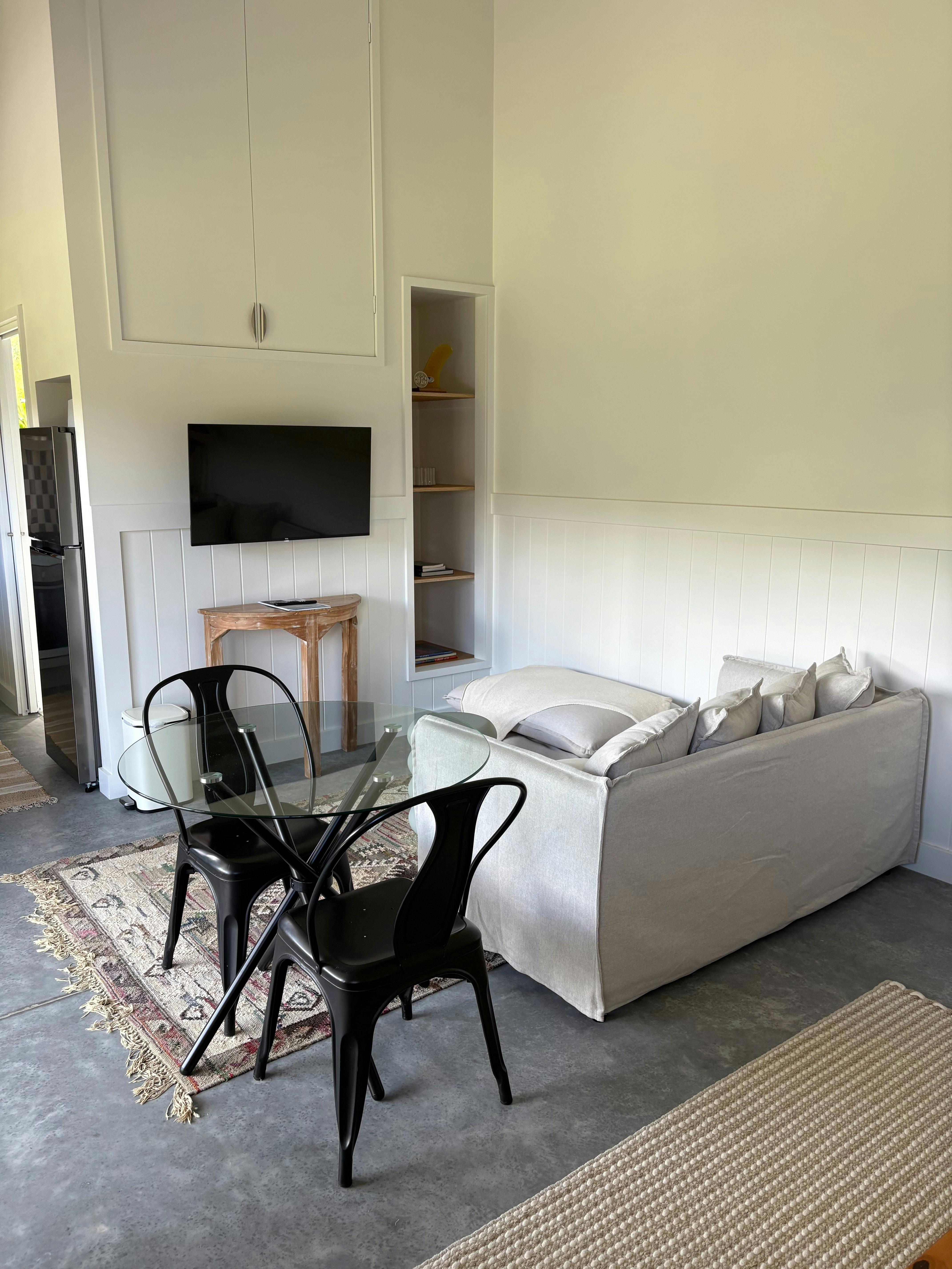 Image of lounge and table with two chairs