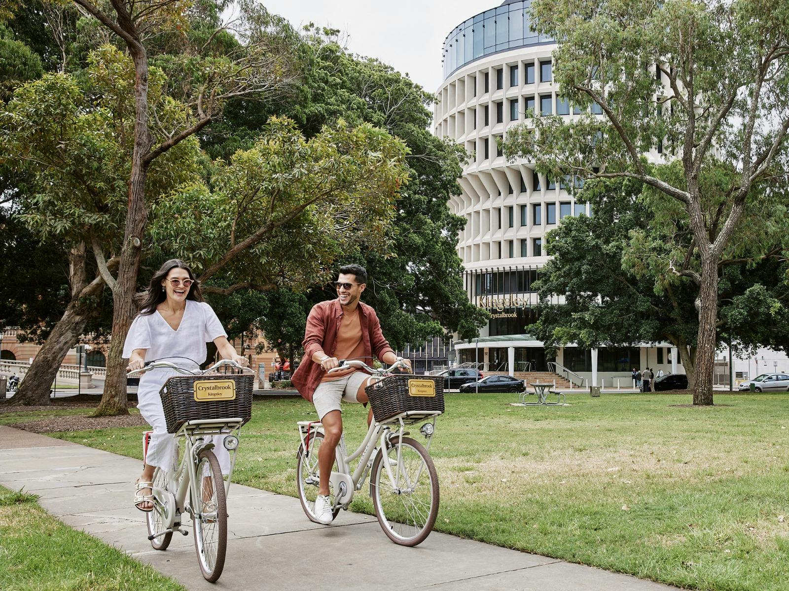 Biking through Civic Park with Crystalbrook Kingsley in the background