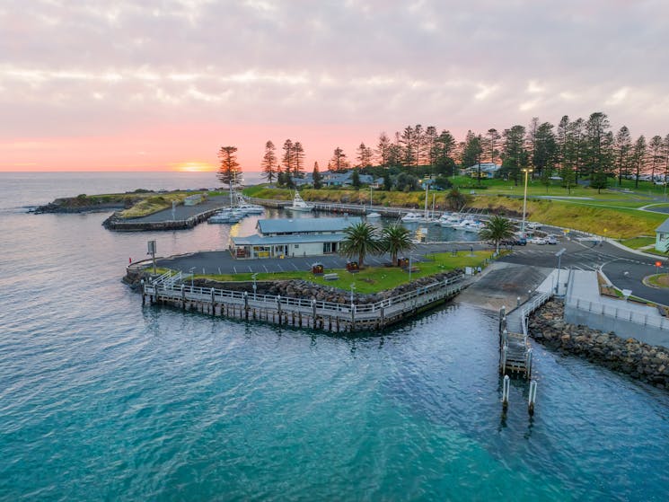 The beautiful Kiama Harbour on sunrise.     Worlds larges blow hole is situated in the background.