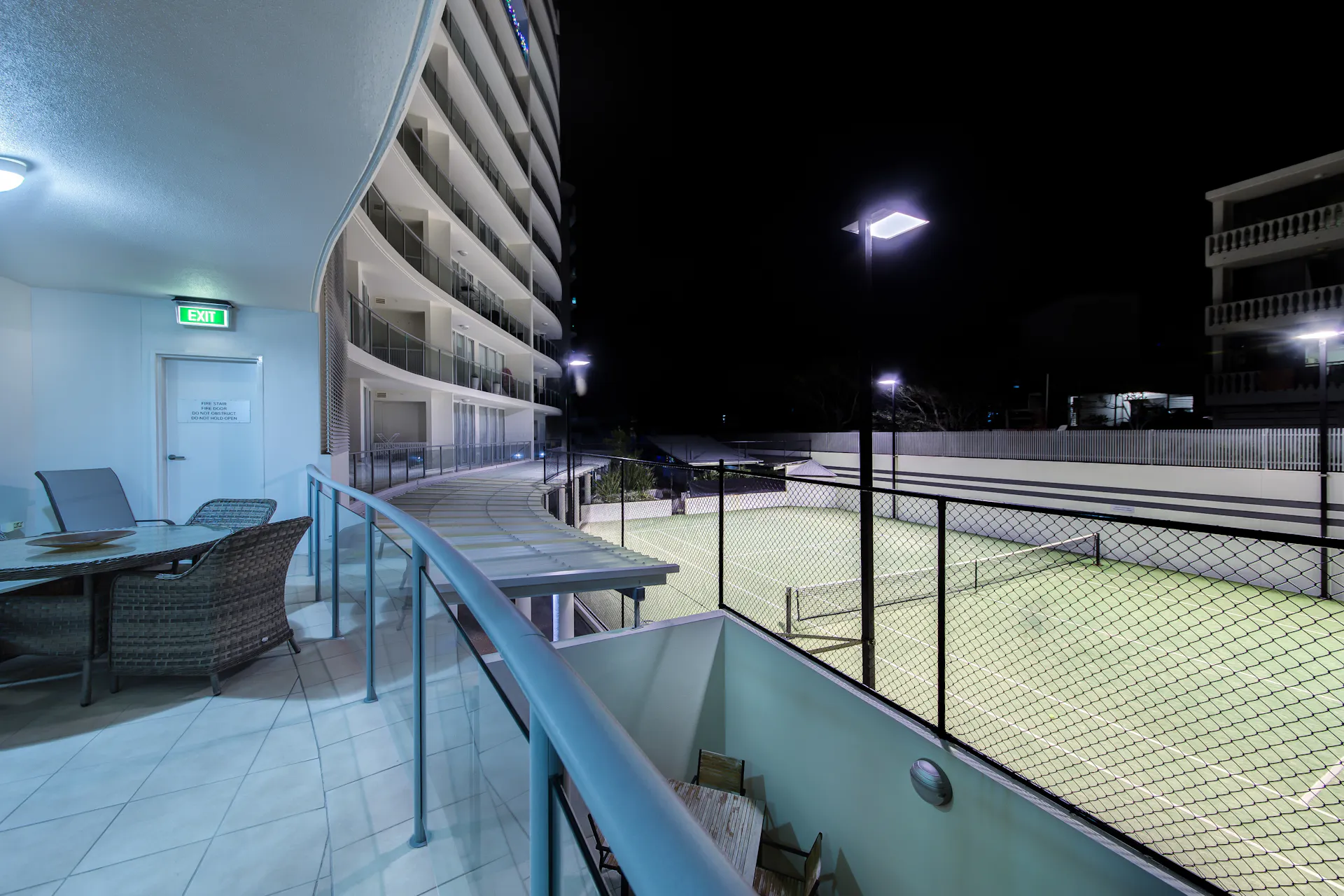 View of Tennis Court. With night lighting you can enjoy a game up to 9 at night