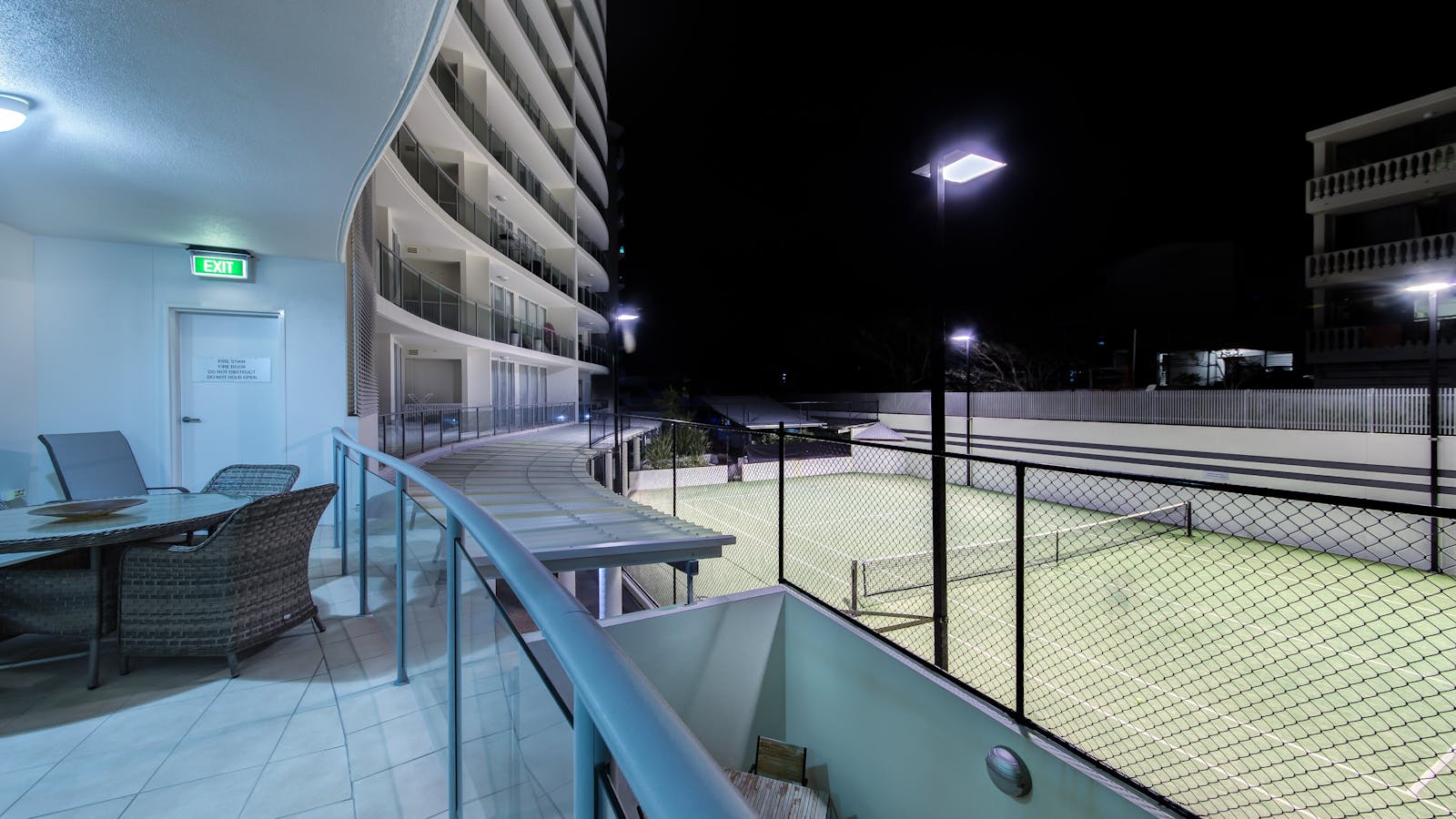 View of Tennis Court. With night lighting you can enjoy a game up to 9 at night