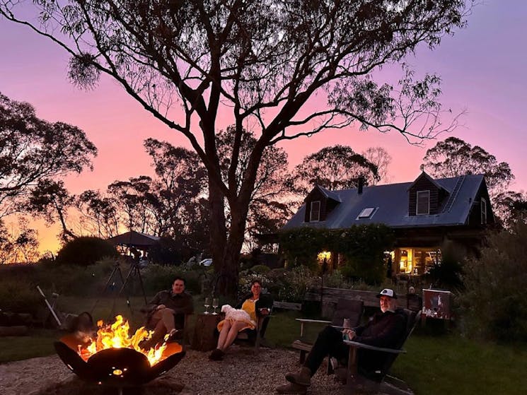 Kookawood Rural Retreat firepit with people at night
