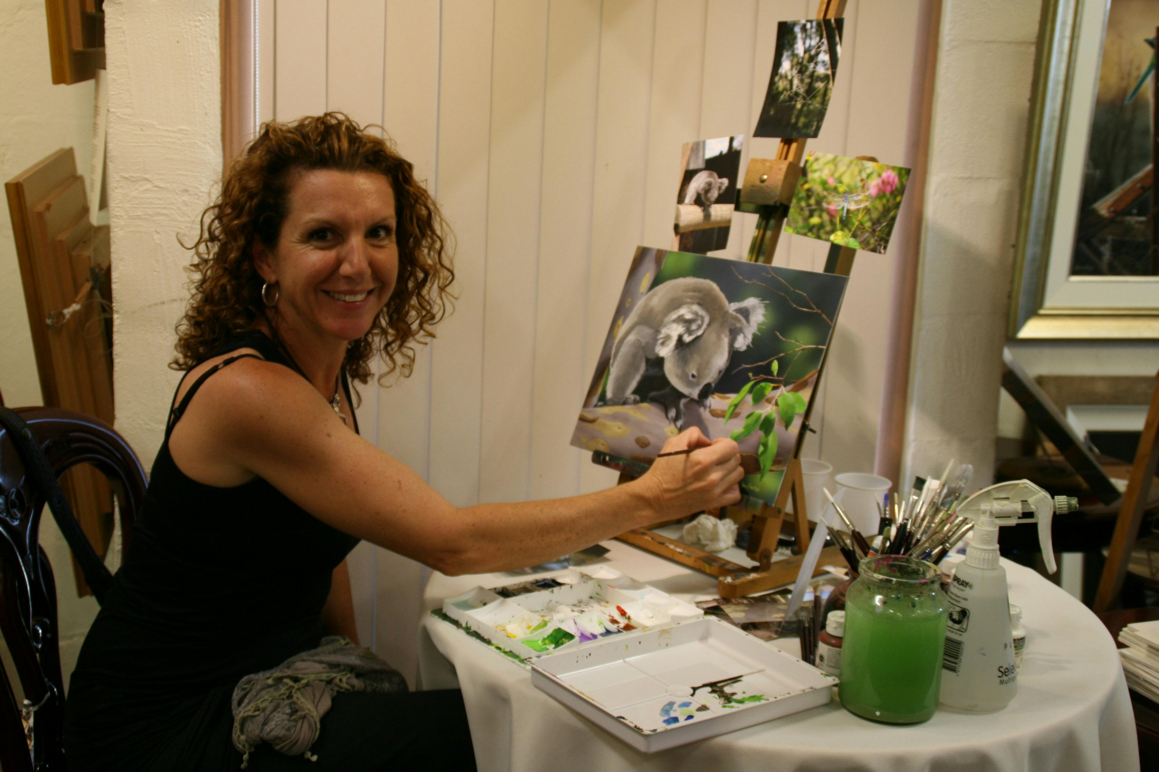 Natalie painting in Morpeth Gallery