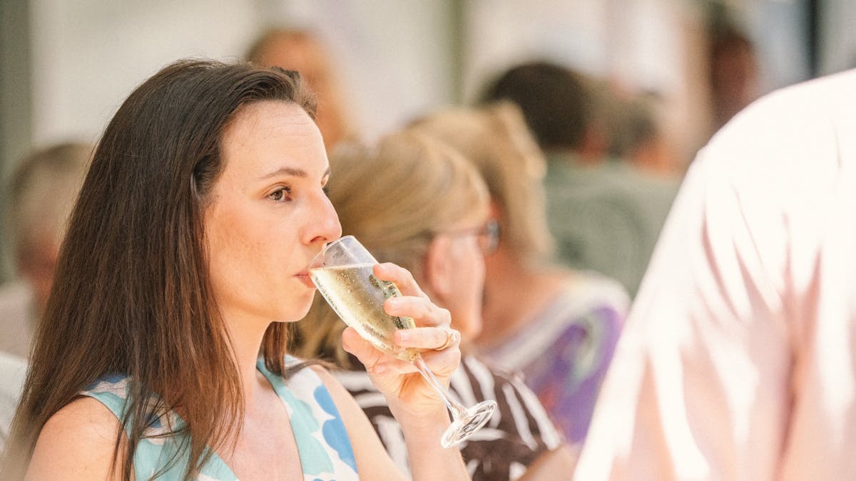 Woman enjoying prosecco