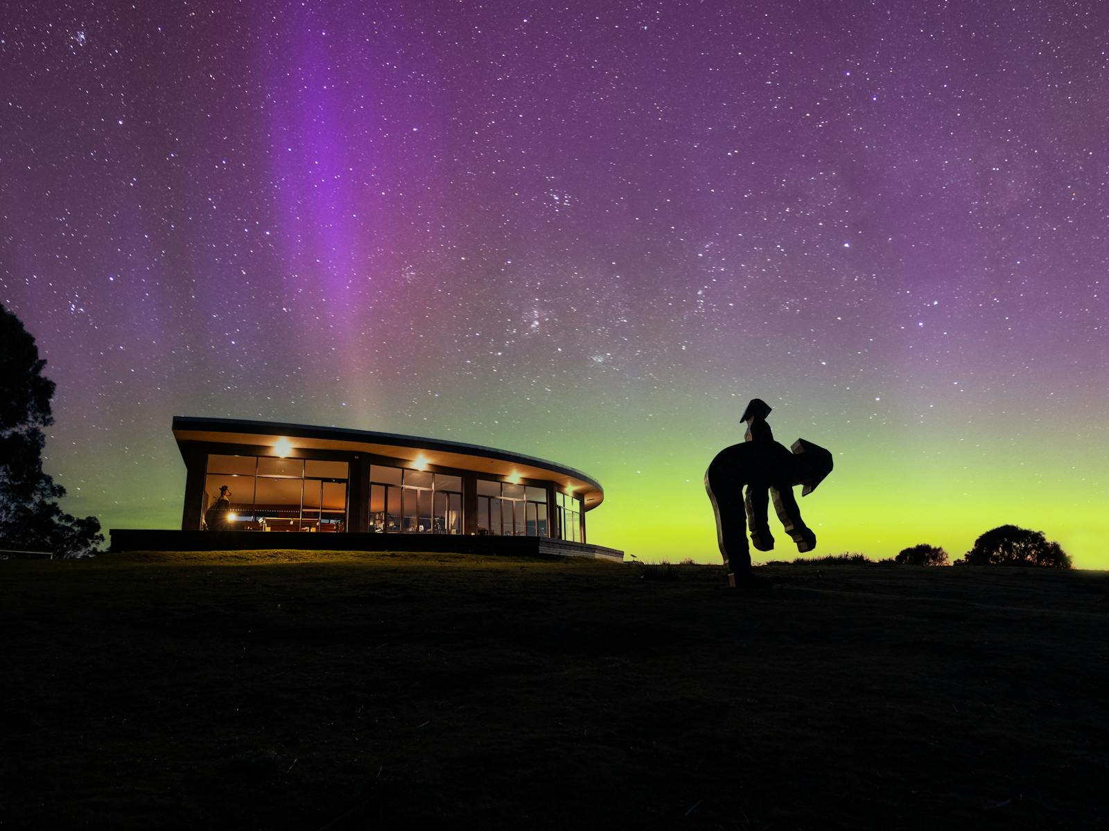 Stunning silhouette of Freycinet Resort’s lounge set against the mesmerizing aurora australis!