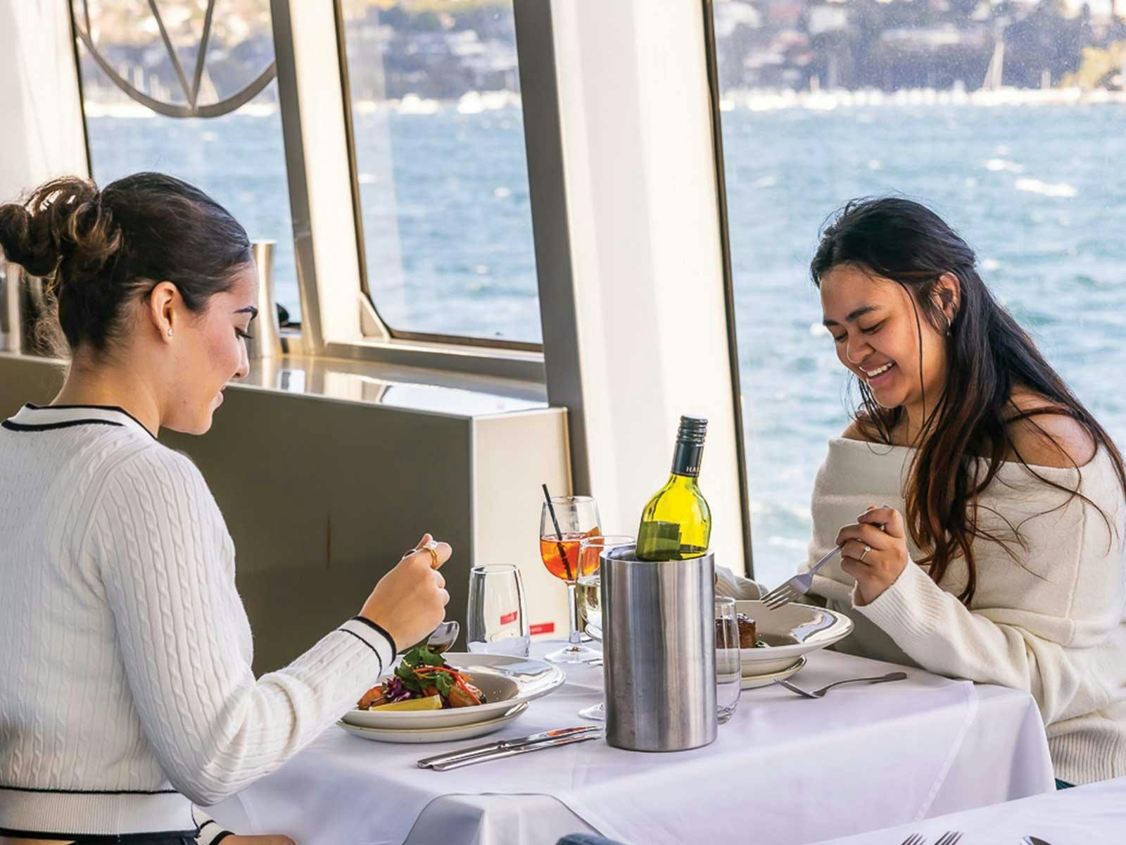 Guests enjoying lunch on Clearview Glass Boat