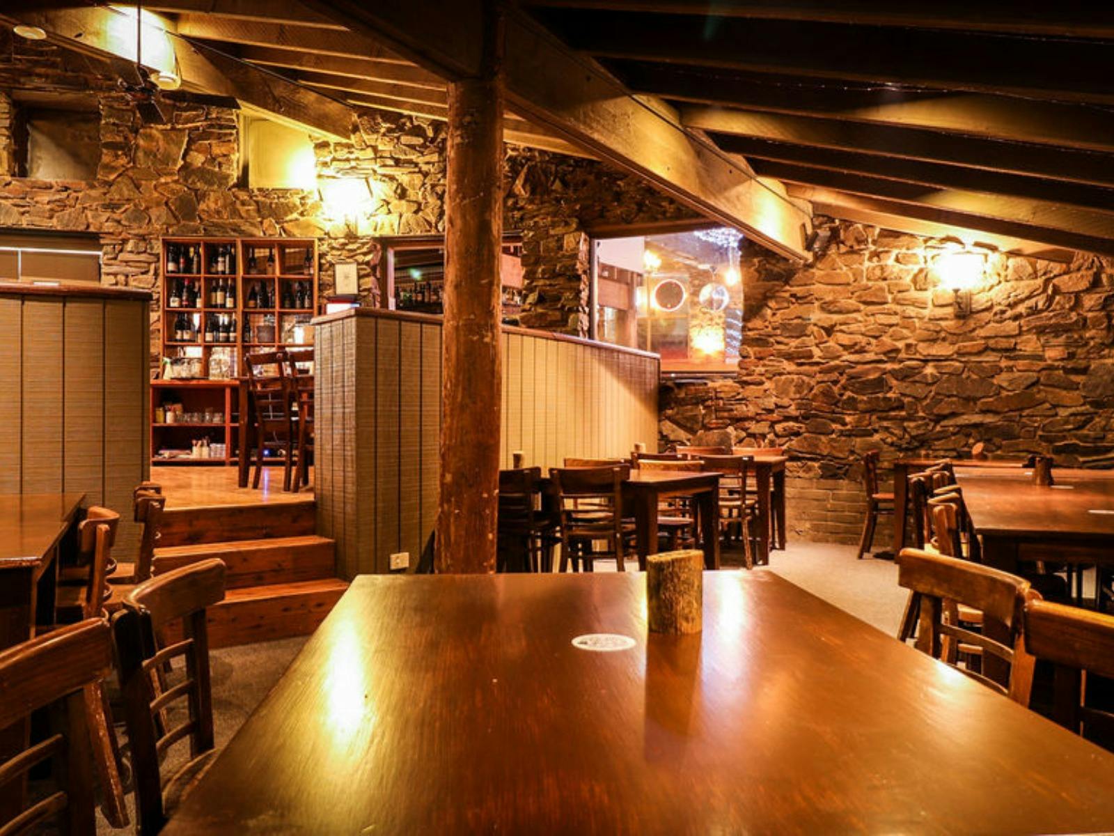 Restaurant, rock walls, ambience, open fireplace, wine