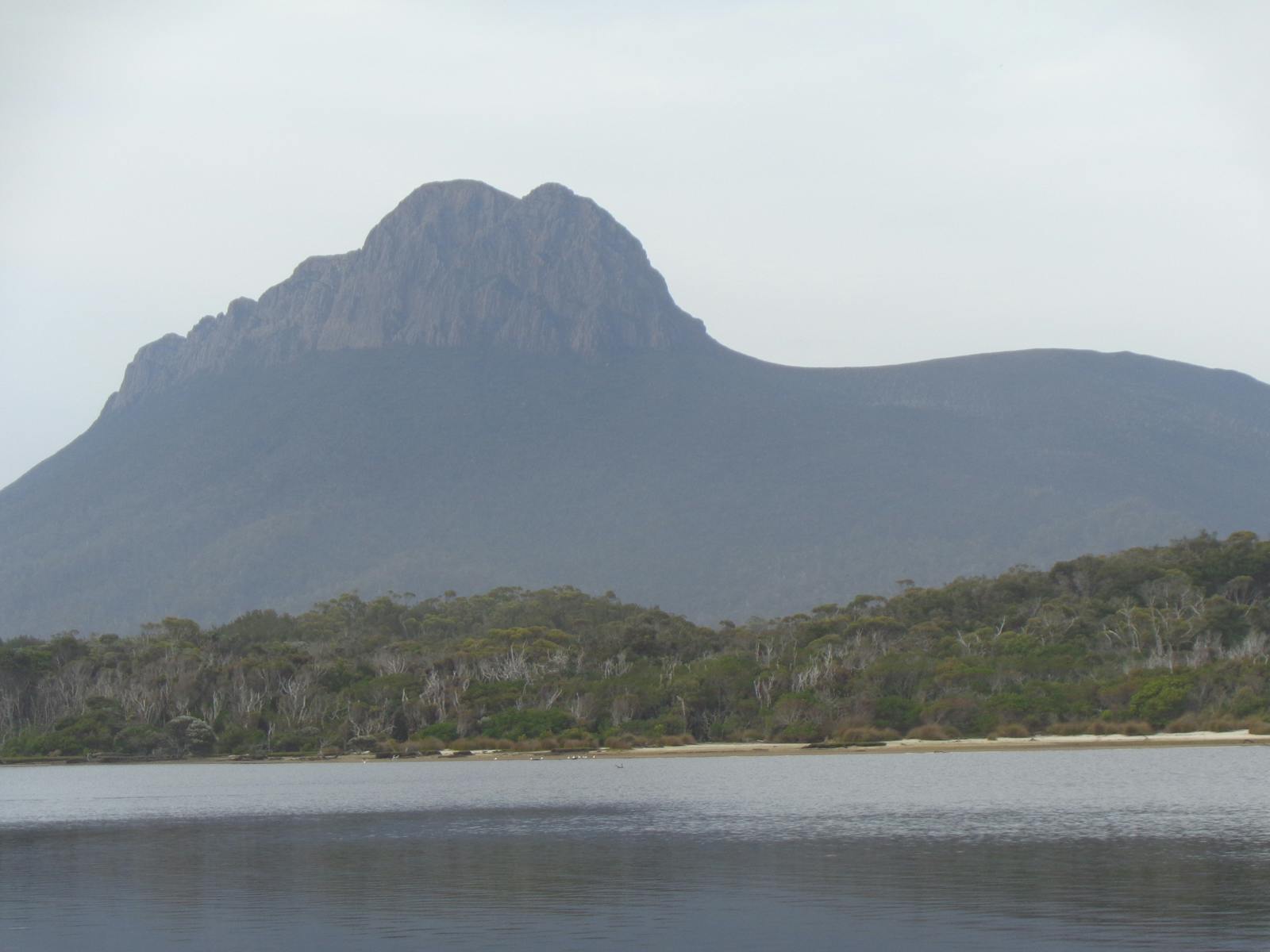 Prion Laggon with Precipitous Bluff in the background - a row across the laggon to a camp site