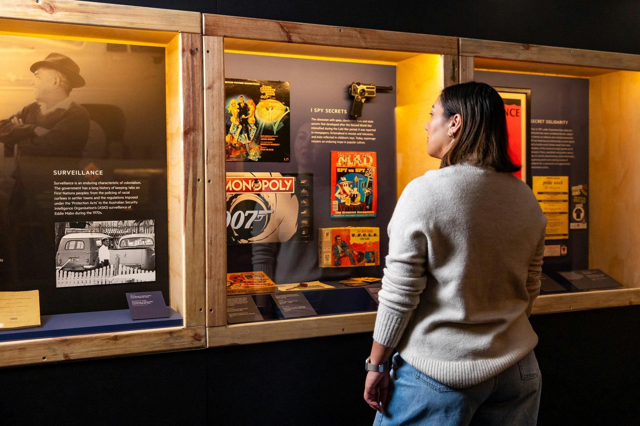 Women engaging with exhibition content