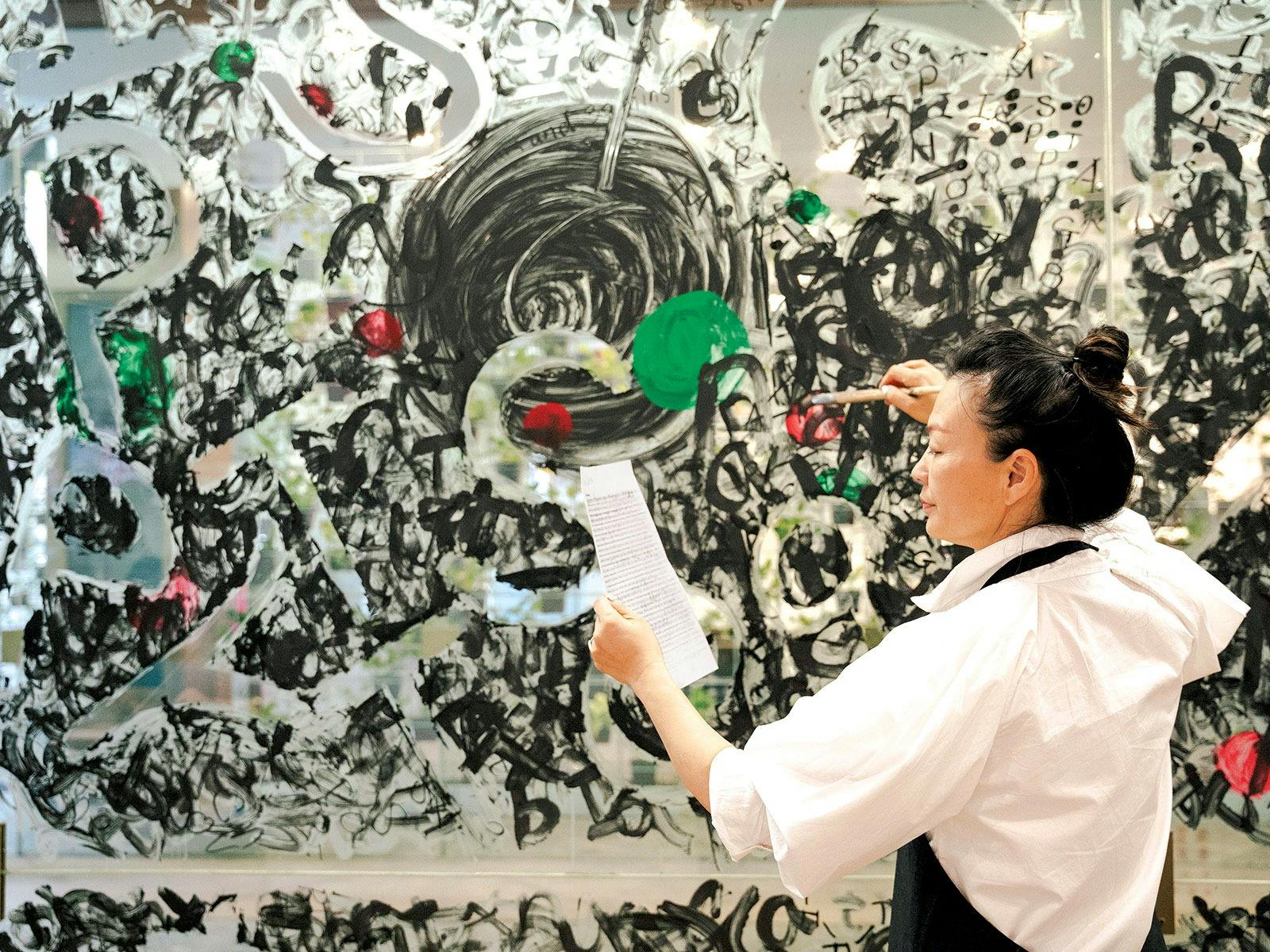 a woman painting