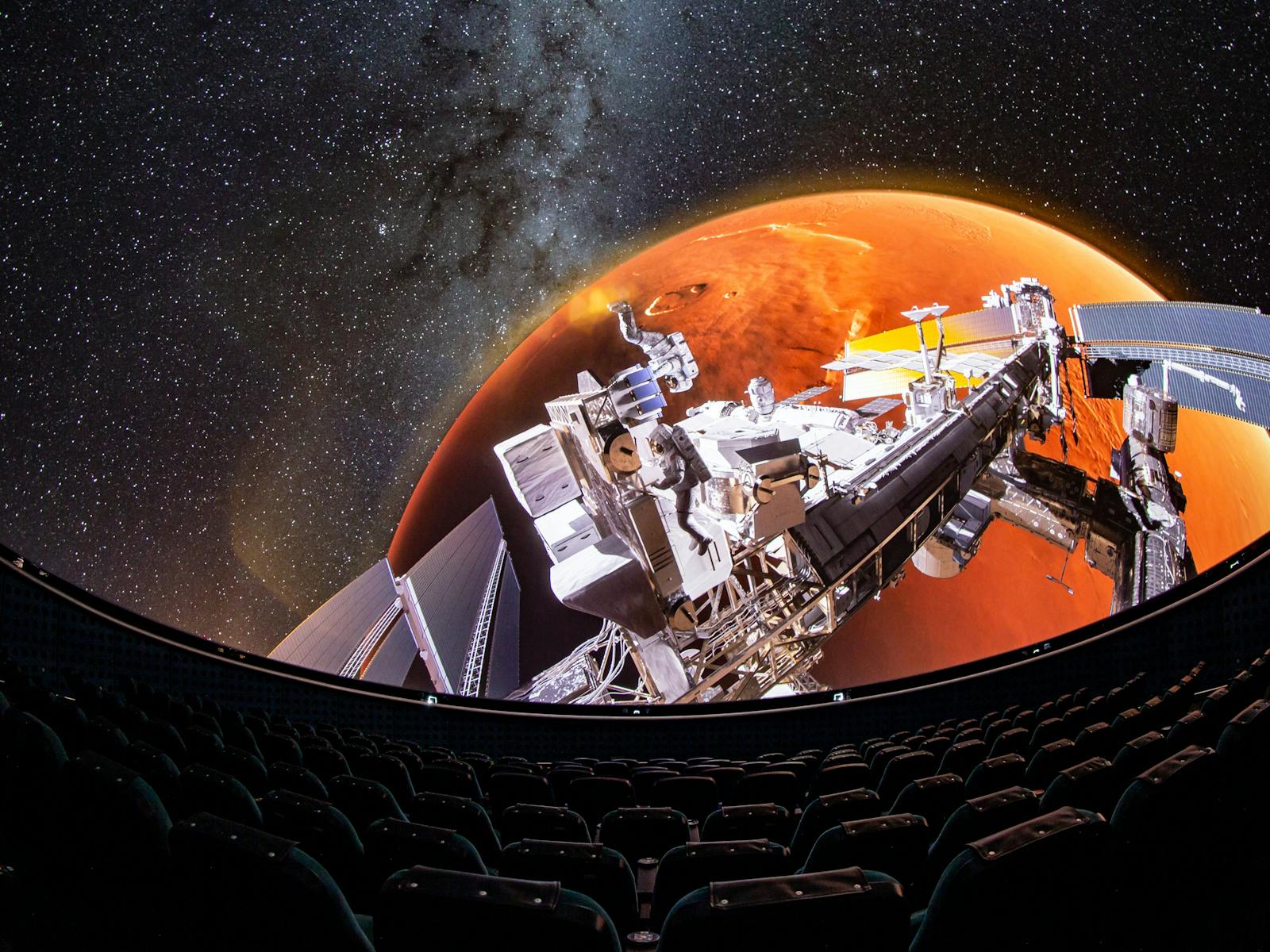 Image from the Dark Side of the Moon planetarium show, depicting a space station above Mars.