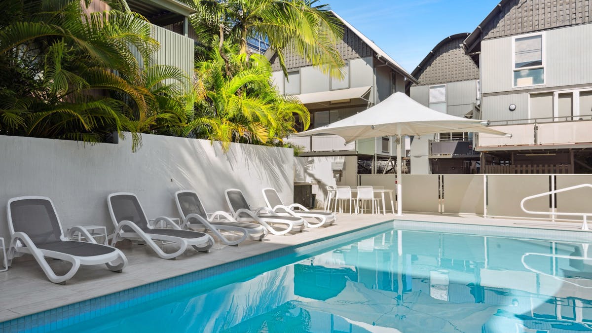 Ascend to the private rooftop terrace, the crown jewel of Villa One Five, where a plunge pool & BBQ
