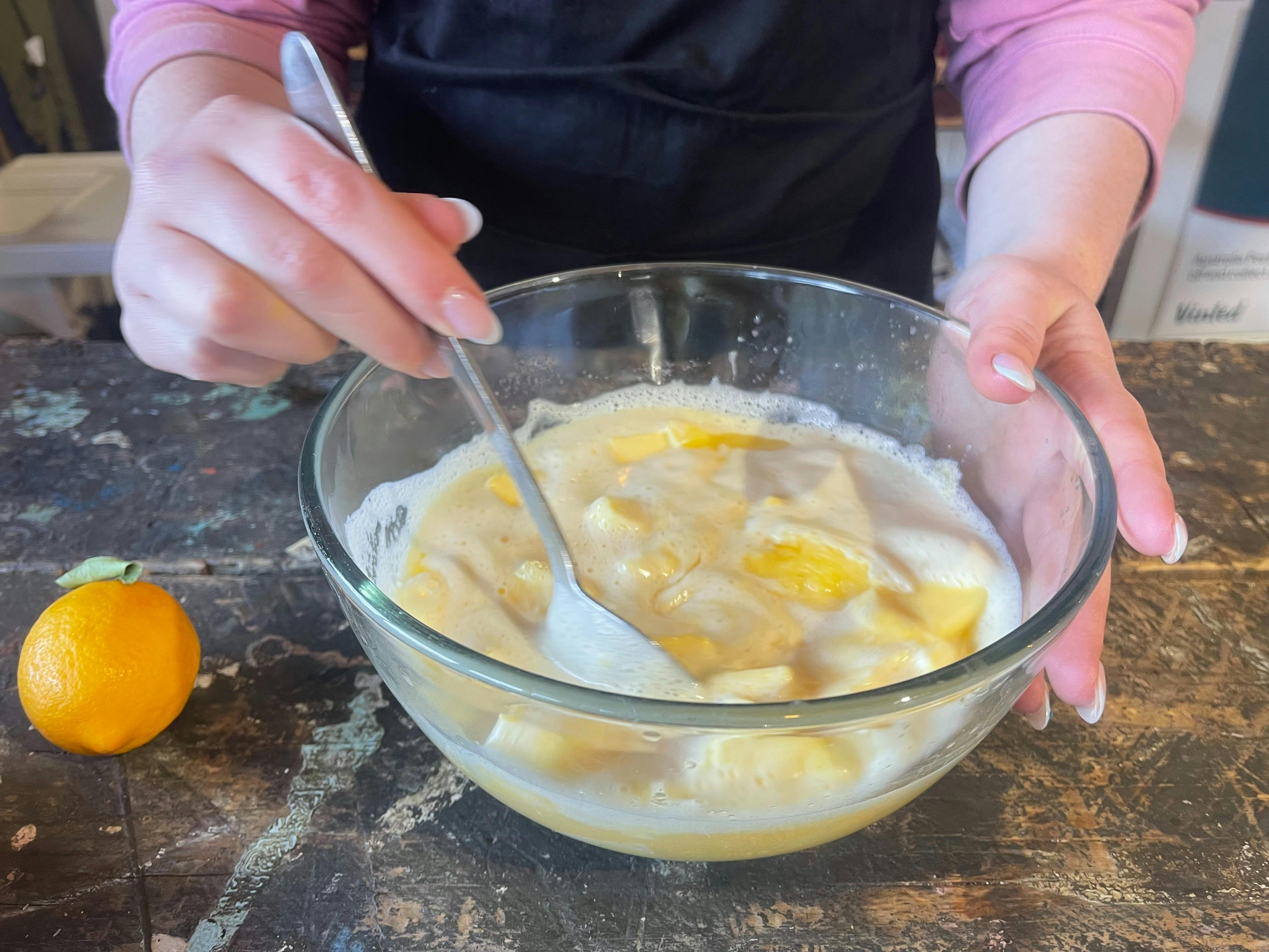 gently stirring in the melting butter