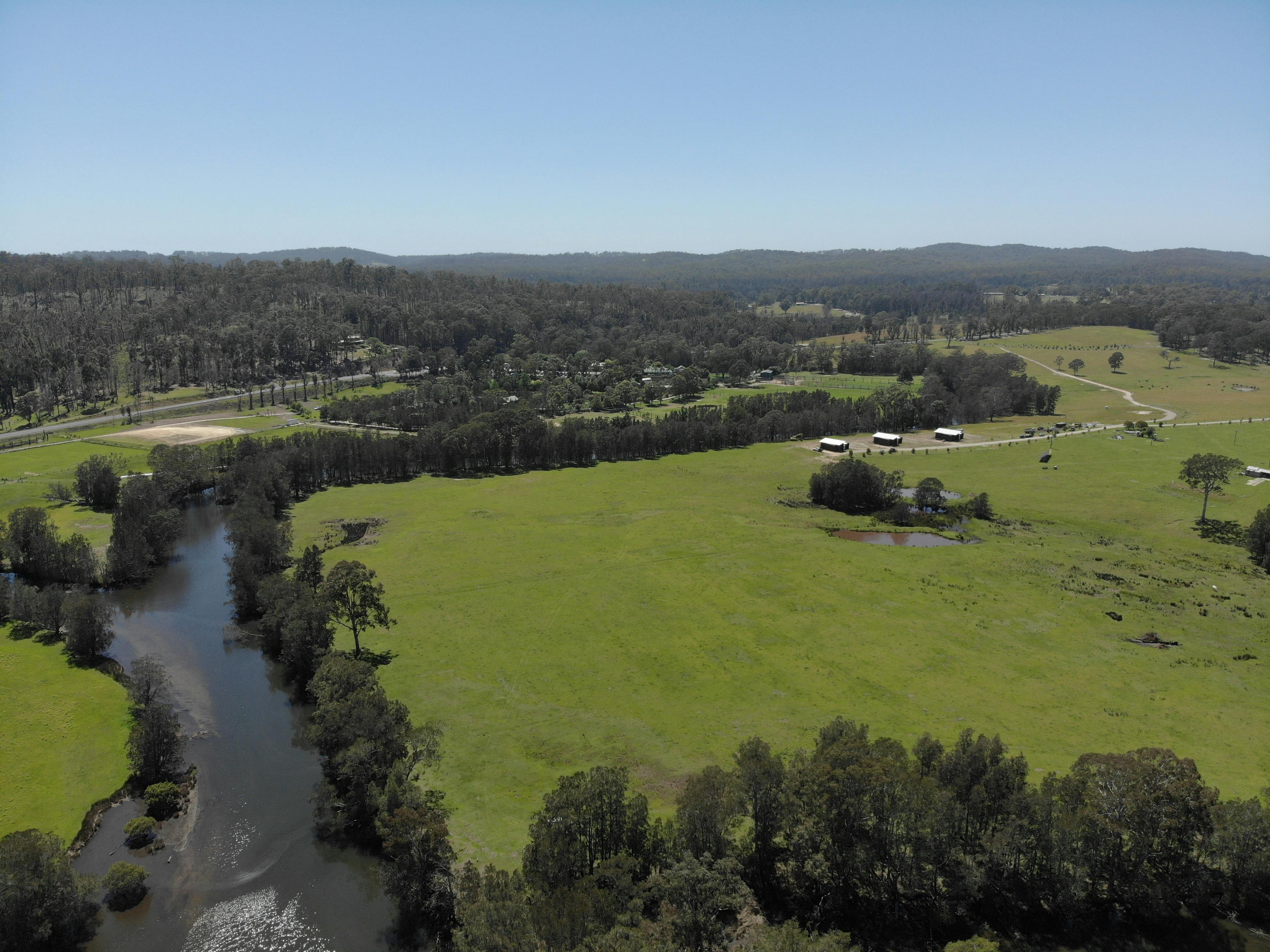 Aerial photo of Tomago River and villas