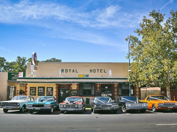 Royal Hotel and wedding cars out front