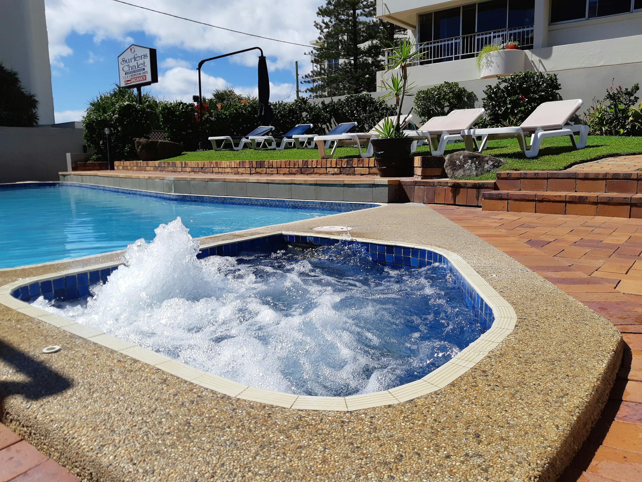 Unwind by the pool and heated spa Unwind by the pool and heated spa
