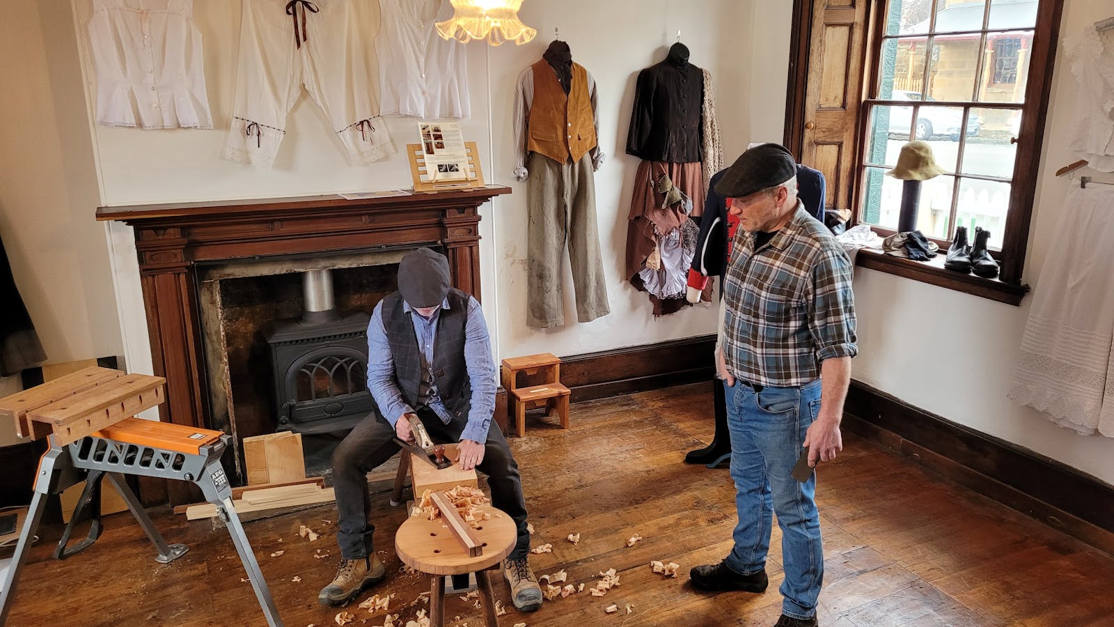 Heritage artisans like Johnny Mackay making handmade items from natural materials in the gallery.
