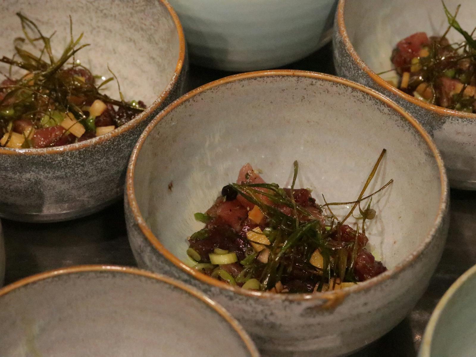 Tuna Crudo with fried spring onions and pickled rhubarb