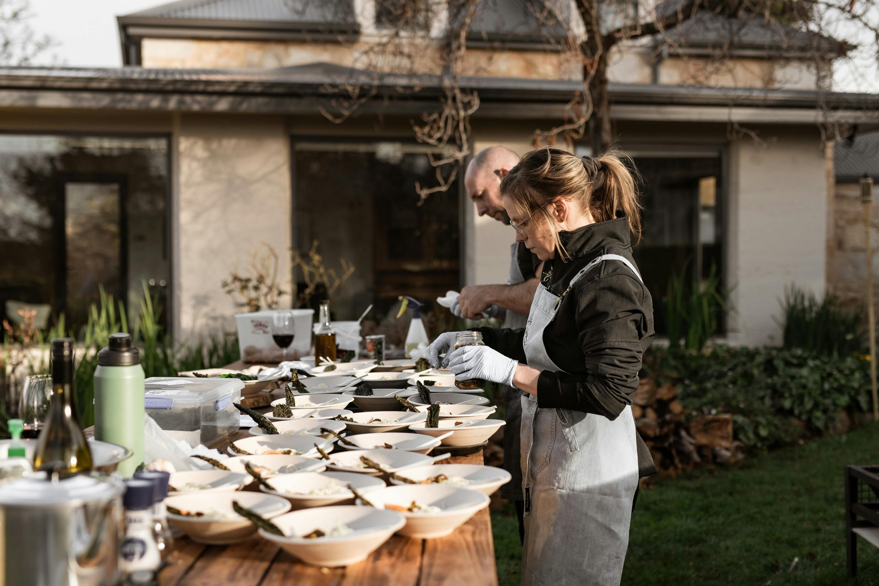 Paul and Sara serving plates