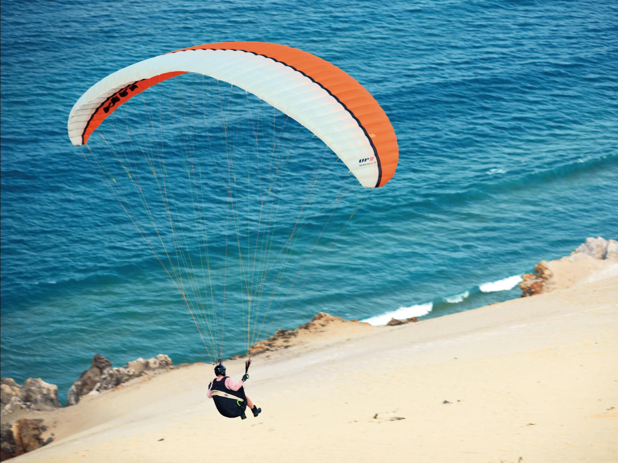 Parachuting in Rainbow Beach, Queensland. Parachuting in Rainbow Beach, Queensland.