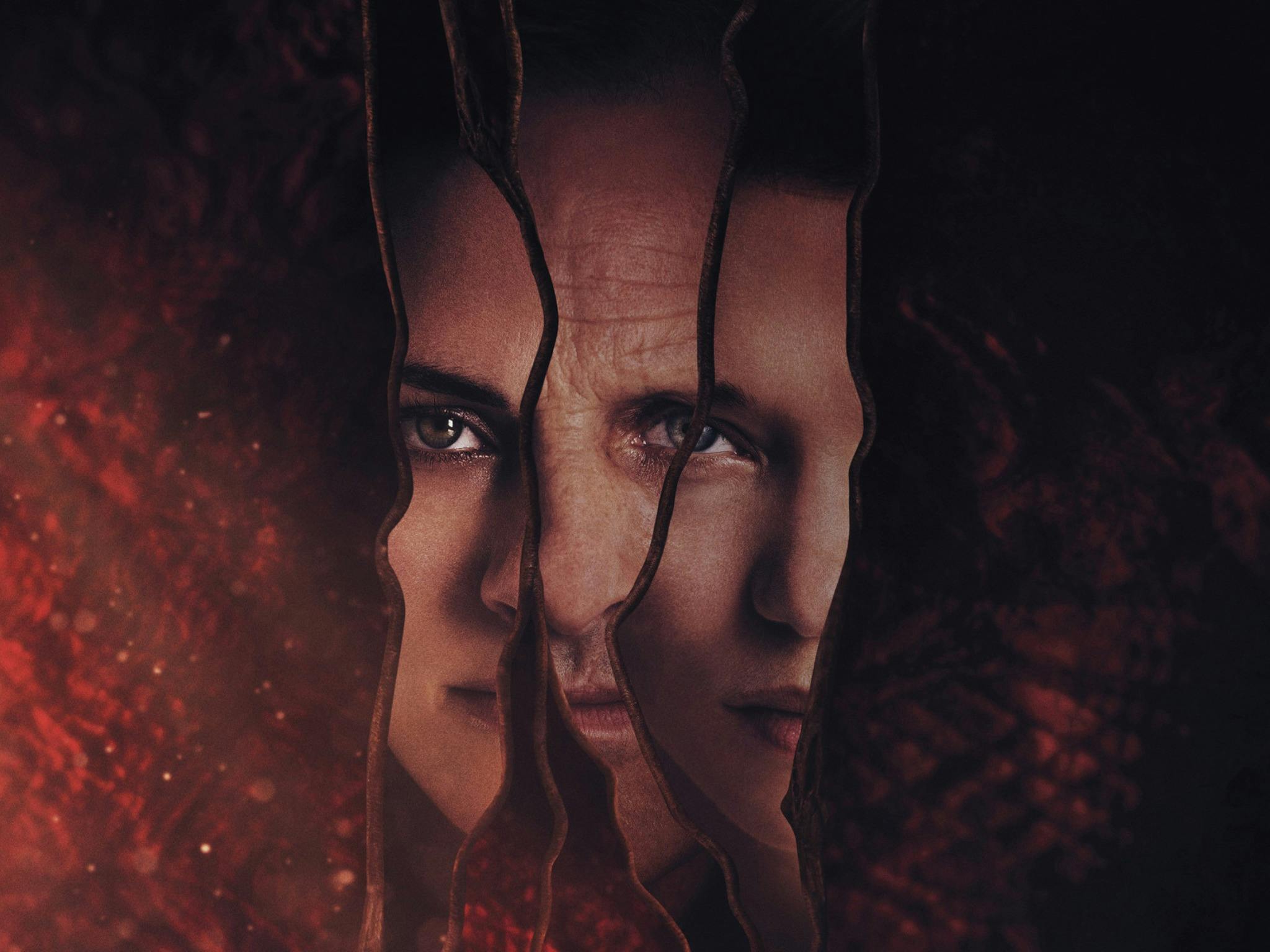 Promotional image for Crimes of the Future showing reflections of three faces