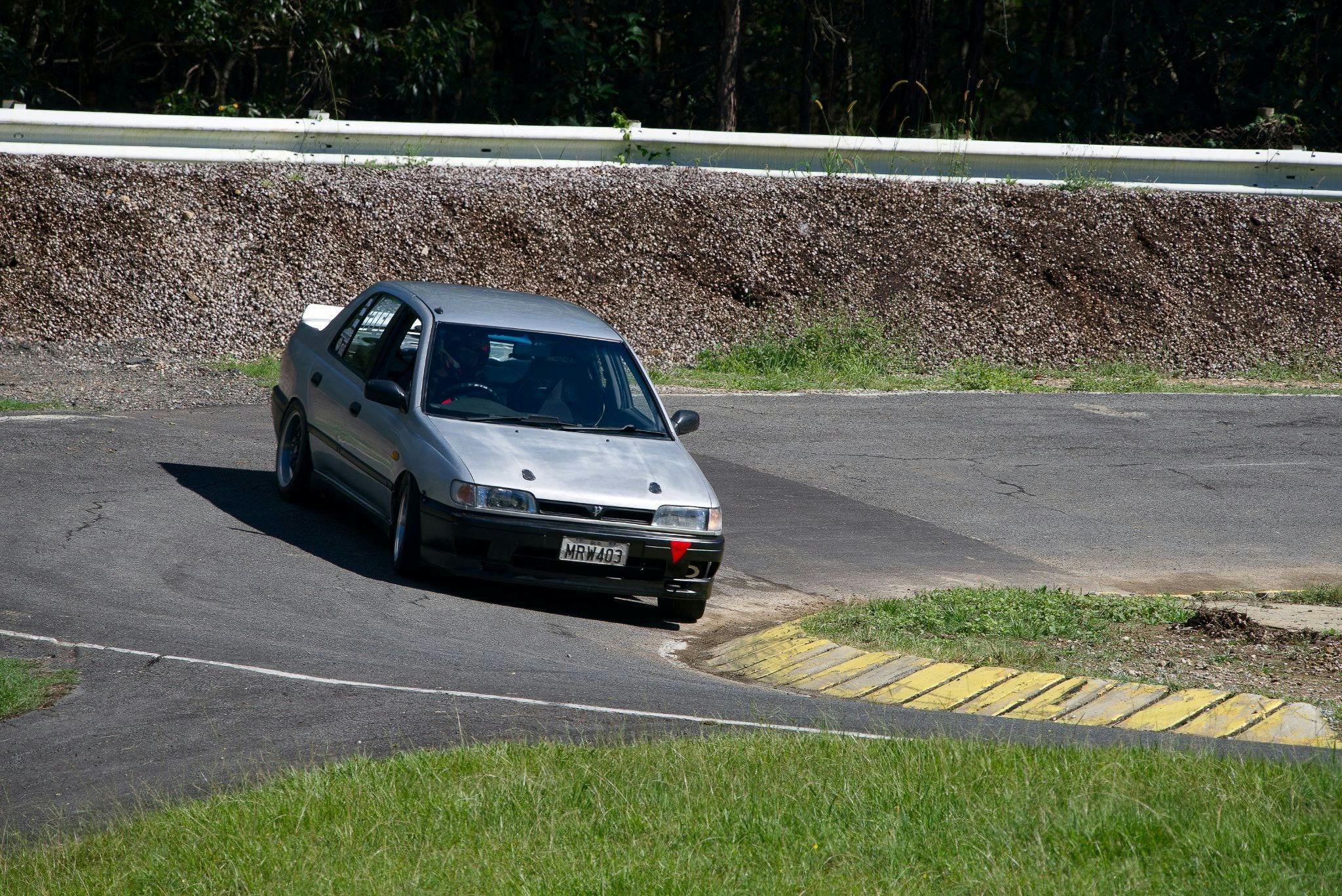 Applying opposite lock in the Nissan Pulsar to exit the hairpin from from the second loop descend