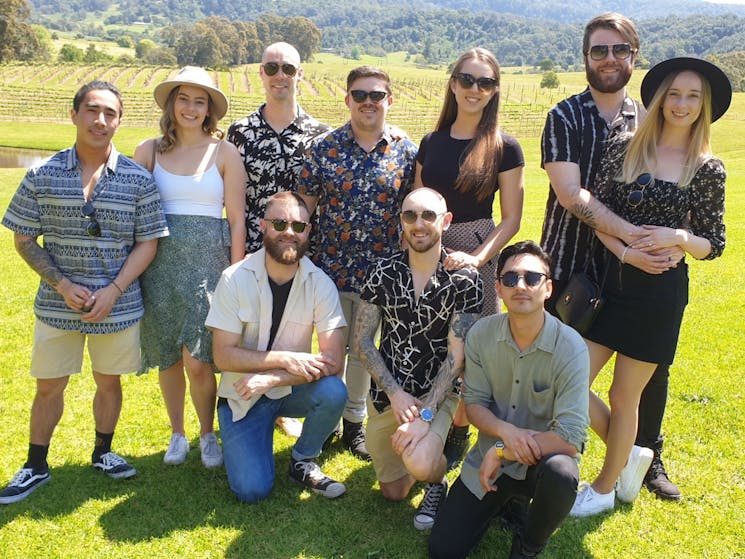 Group of friends at vineyard at a Kenny Escapes Tour