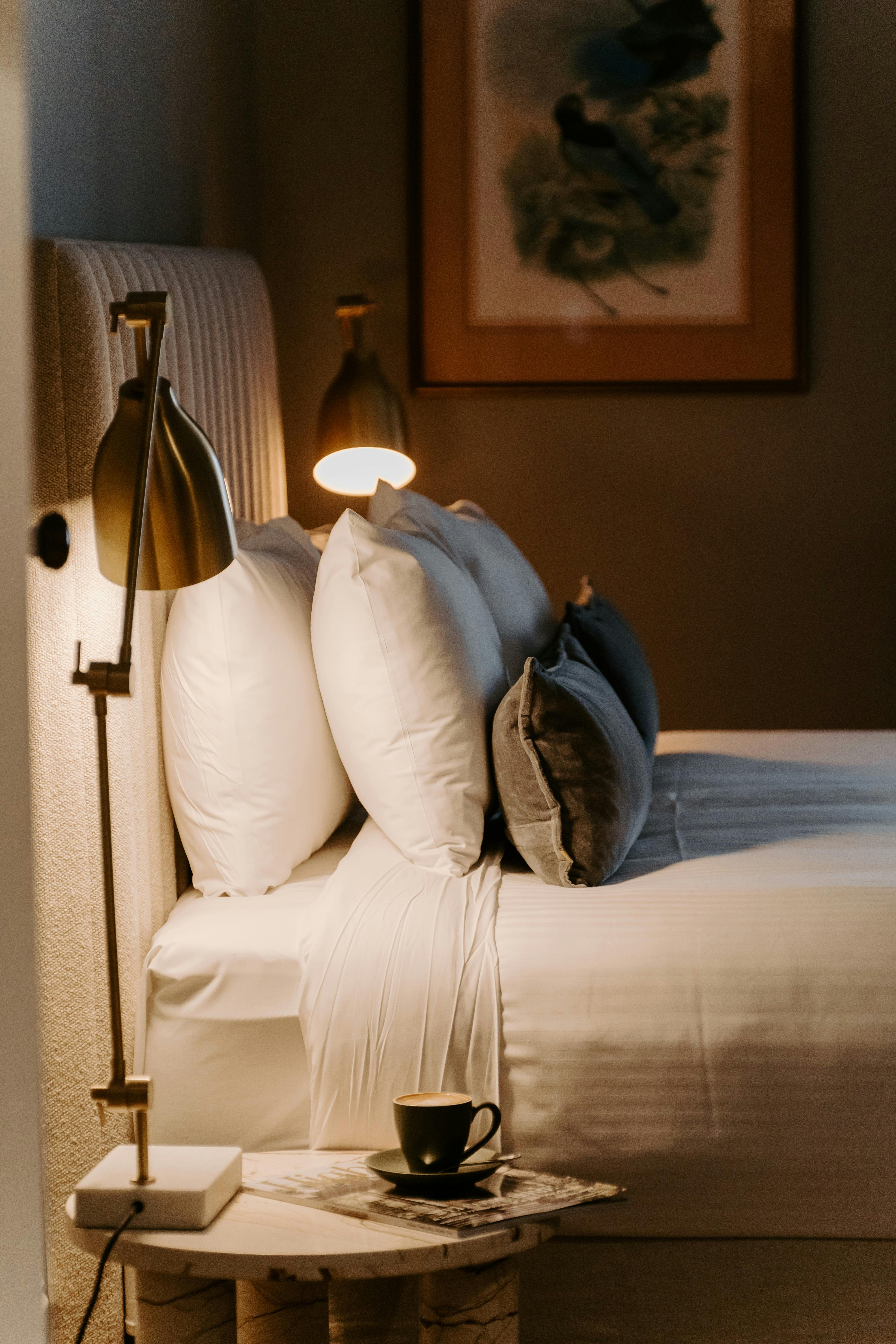 Bed with 2 gold lamps