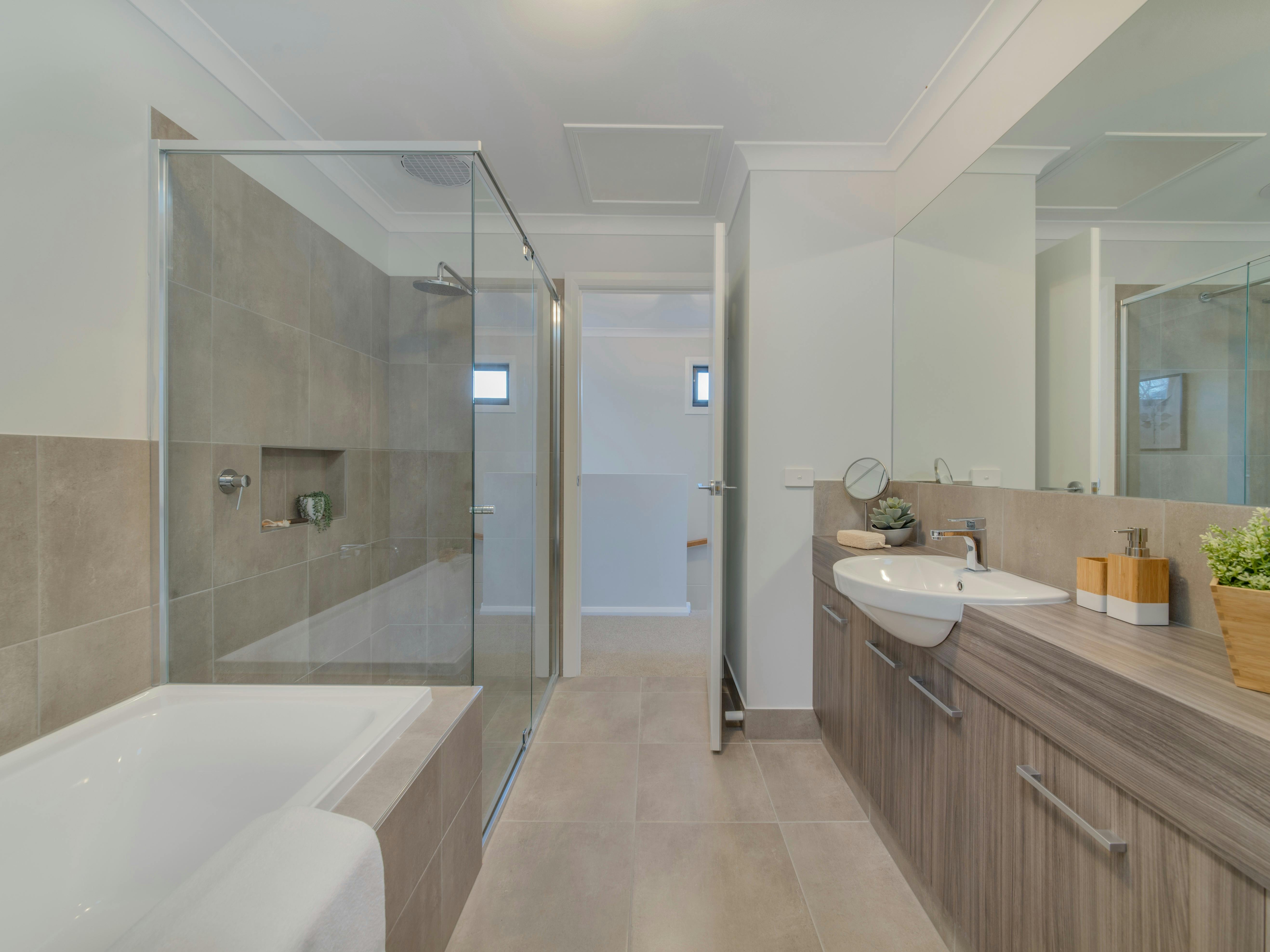 picture of bathroom with shower, bath and vanity