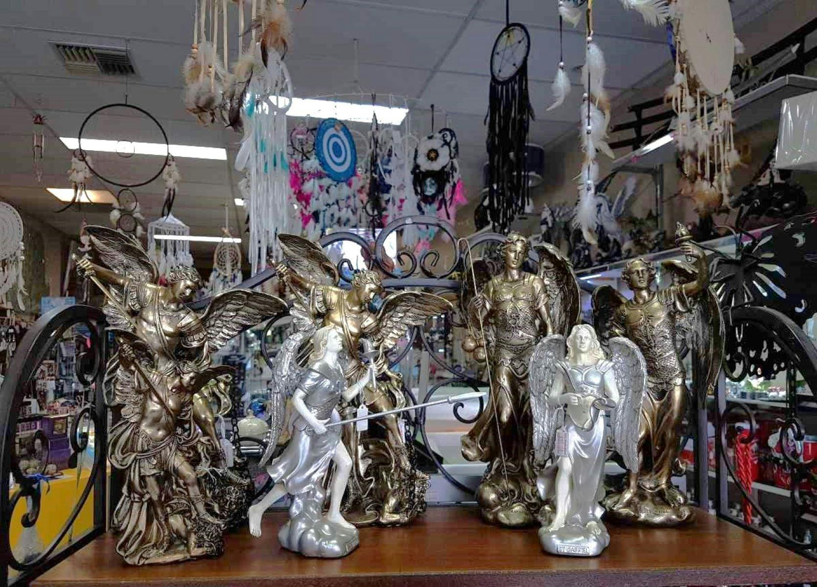 An array of angel statues in different poses.