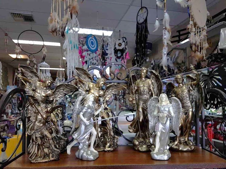 An array of angel statues in different poses.