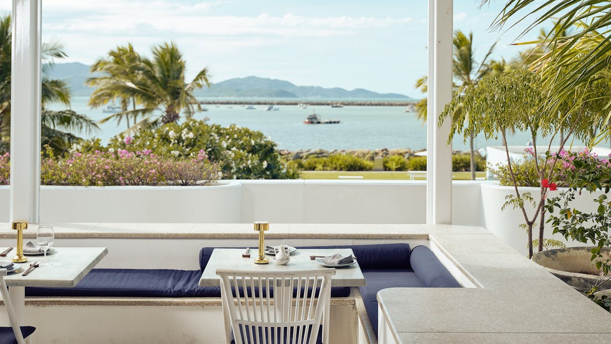 External shot of a dining table in the day time.