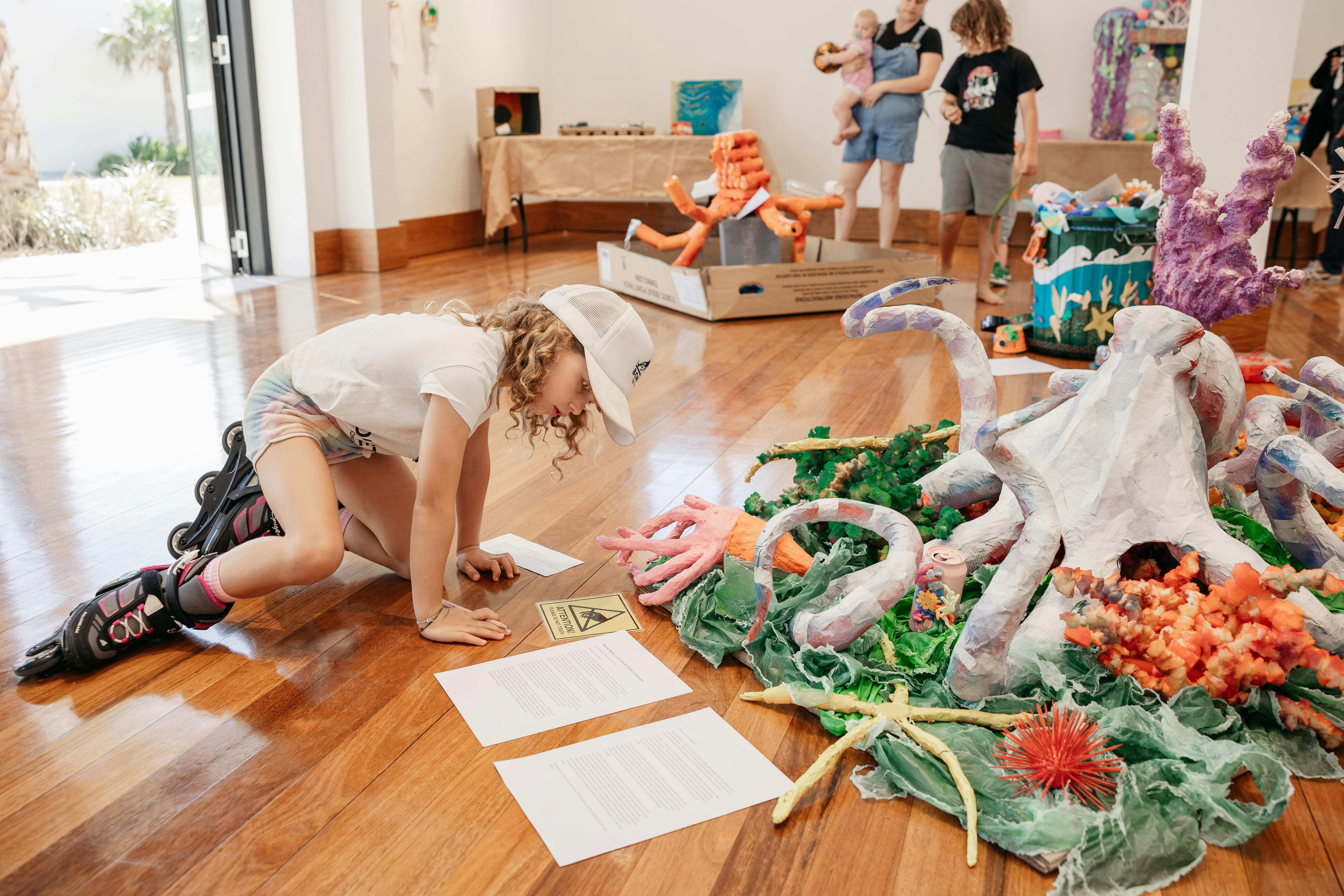 Child looking at artwork